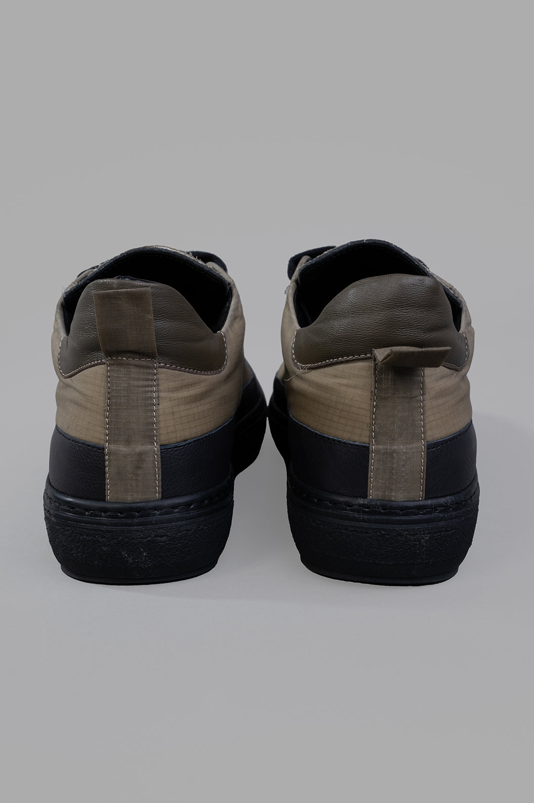 Masnada Low-top Sneakers in green, showcasing the back view with contrasting materials and stylish design details.