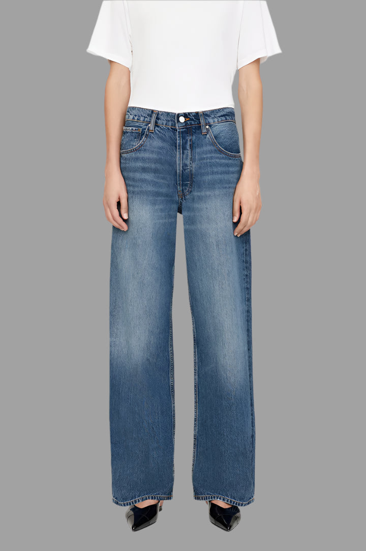 Anine Bing Manon Jeans in vintage blue wash, wide-leg design shown on model, featuring five pockets and clean hem.
