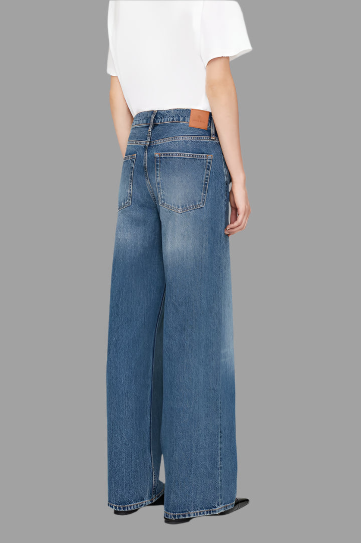 Anine Bing Manon Jeans in vintage blue wash, featuring a relaxed wide-leg fit and traditional five-pocket design, back view.