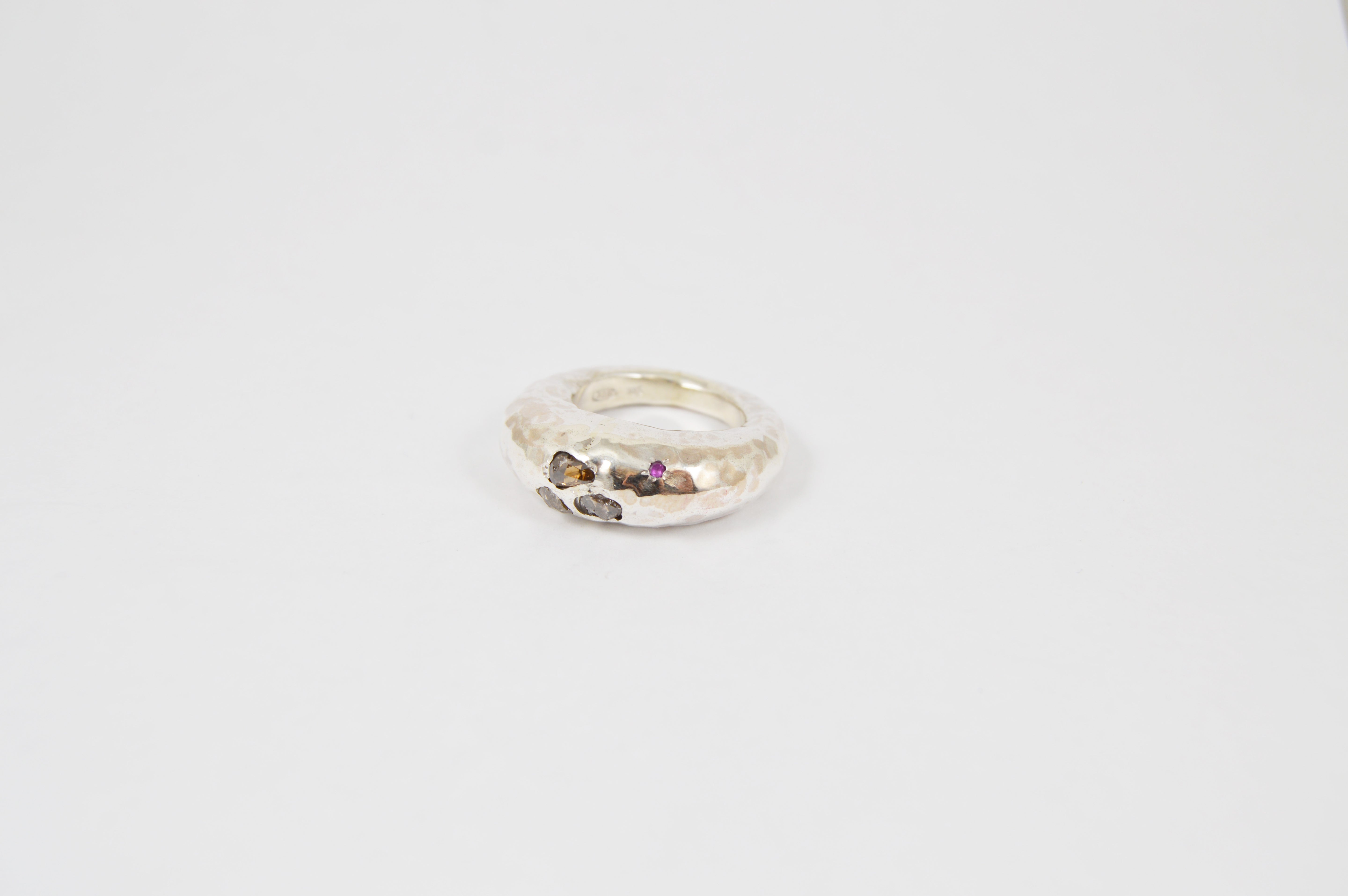 Rosa Maria Brandy Ring, featuring a hammered silver design with three unique stones, angled for detail. Perfect for any occasion.