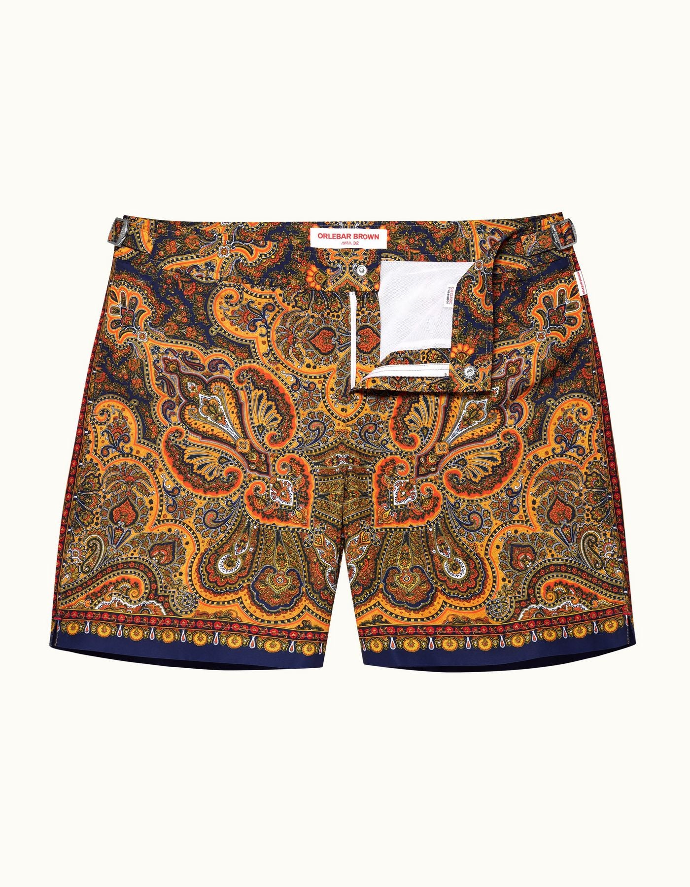 Orlebar Brown Mystique Print Swim Shorts showcasing a vibrant paisley pattern, featuring adjustable side fasteners.