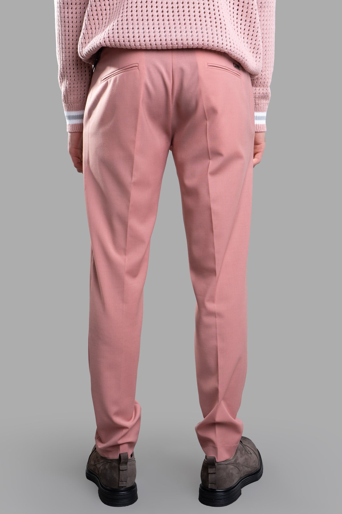 Gaëlle Paris. Back view of pink straight-leg trousers featuring side pockets and a center crease for a polished look.