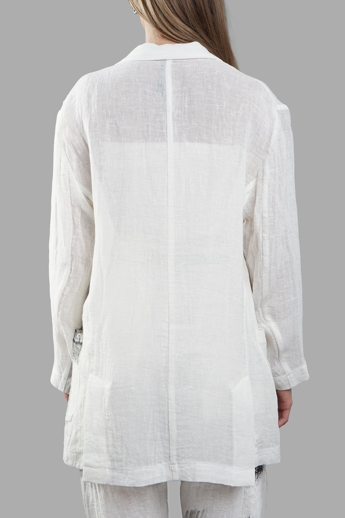 Giovanni Cavagna Painted Blazer showcasing the back view, highlighting its lightweight, textured linen fabric and elegant.