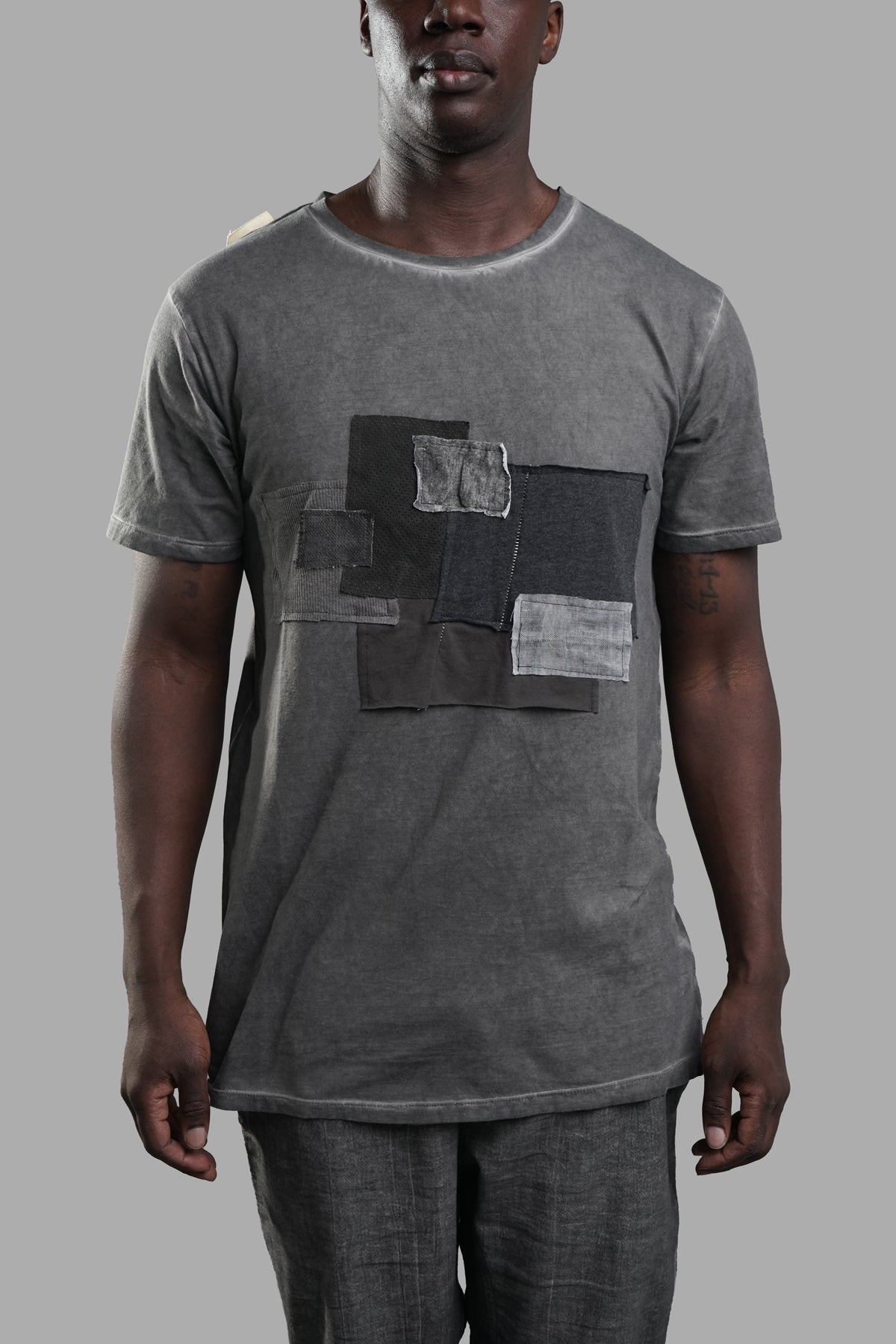 Marc Point Graphic T-shirt in grey featuring a relaxed fit, round neck, and unique graphic detailing on the front.