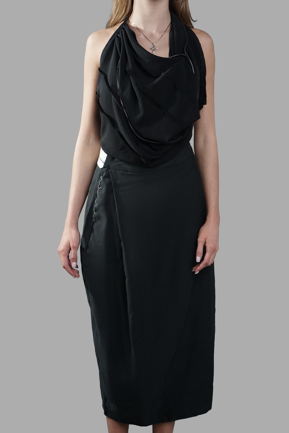 Giovanni Cavagna Open-back Dress featuring a draped front and oversized pencil skirt, shown from the front in black fabric.