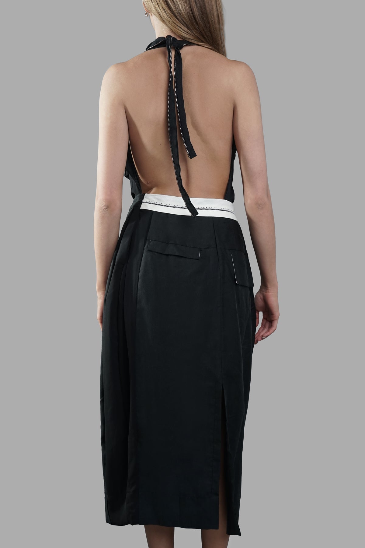 Giovanni Cavagna Open-back Dress showcasing a draped front and elegant open back design, viewed from the back.