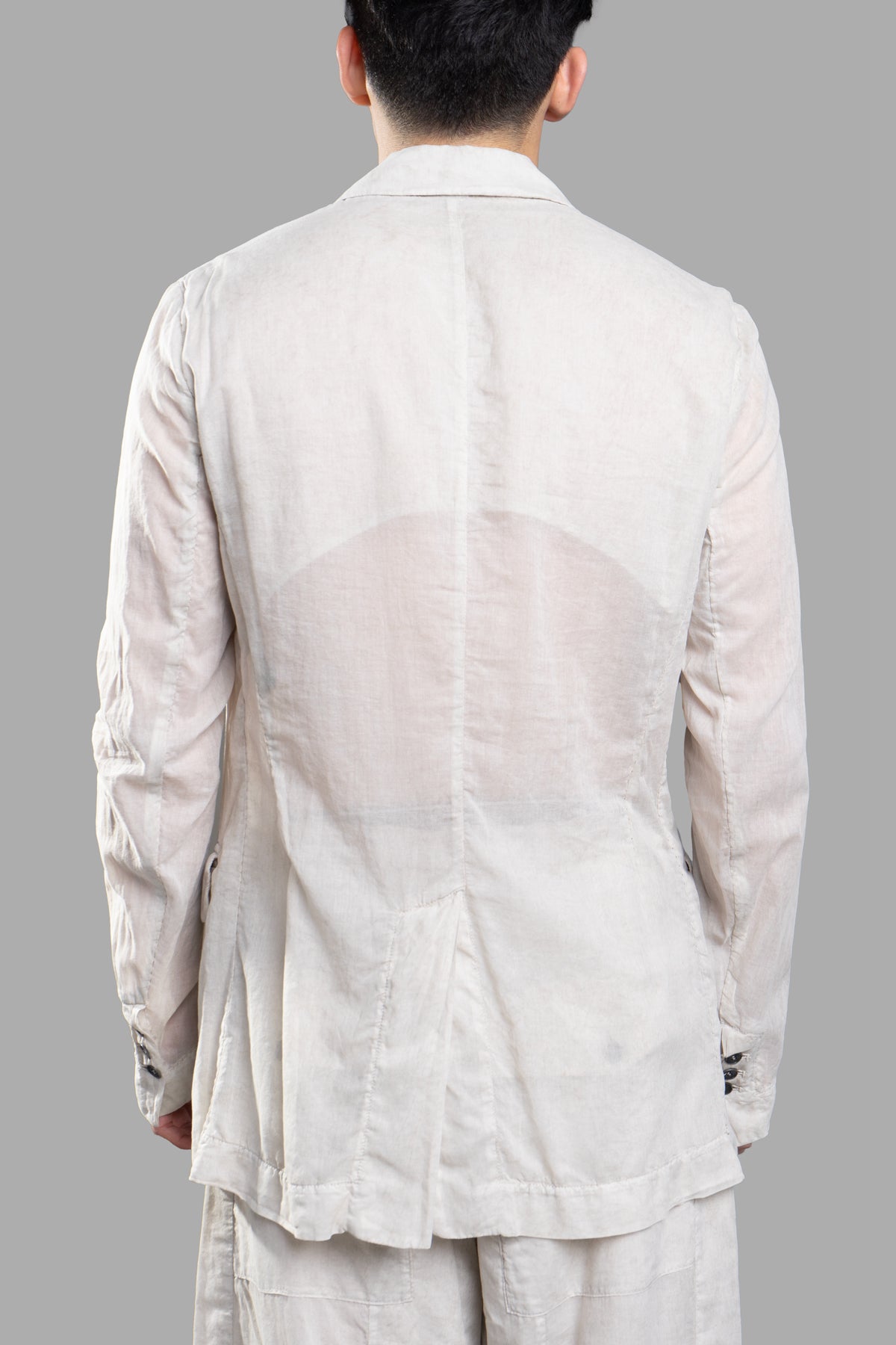 Masnada Lightweight Blazer in Moon, showcasing the back with sleek hem and modern design details. Perfect for stylish.