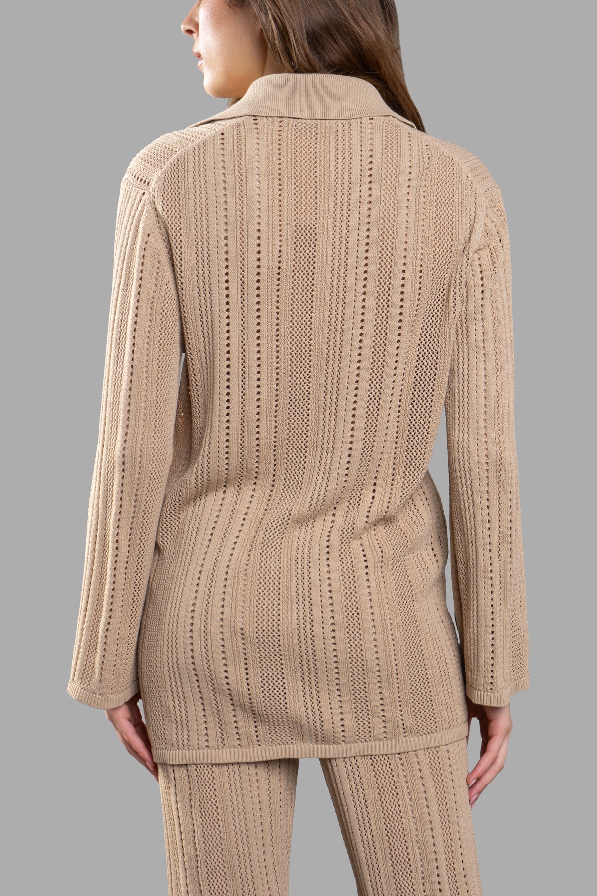 By Malene Birger Open-knit Cardigan, back view showcasing the textured fabric and elasticated waistband in sand beige.