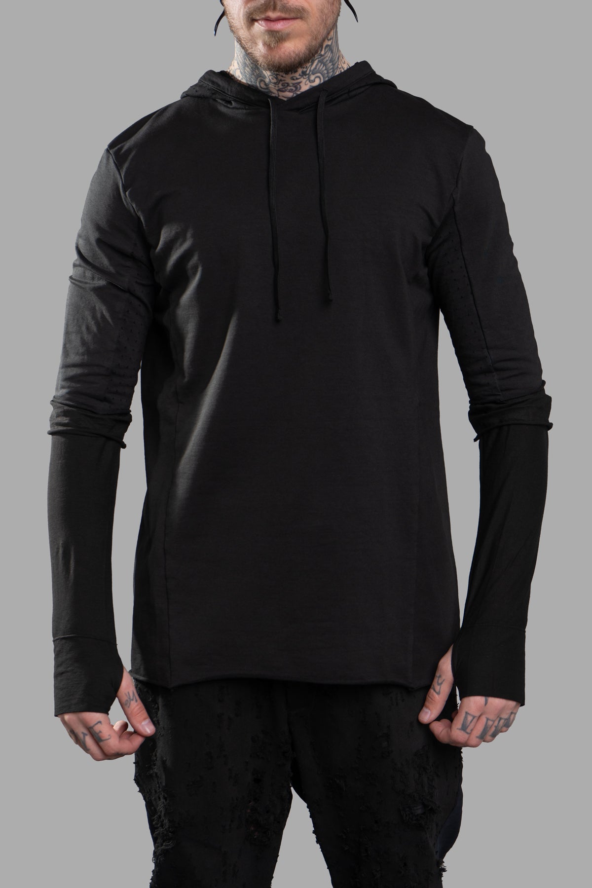 Masnada Layered Hoodie in black, featuring a soft cotton jersey with a unique layered design, narrow fit, and long sleeves.