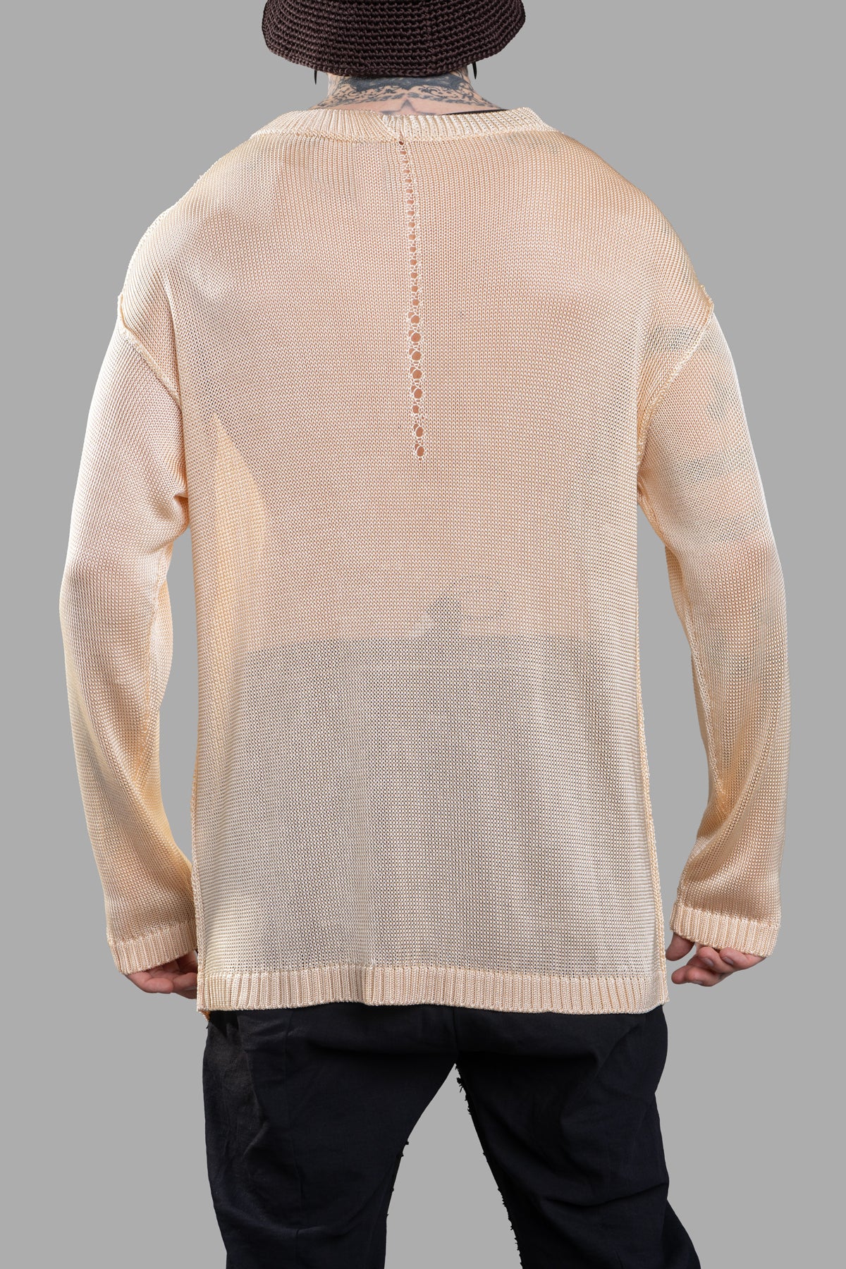 Giovanni Cavagna See-through Sweater in beige, showcasing the back with a unique lace-up detail and soft, semi-sheer texture.