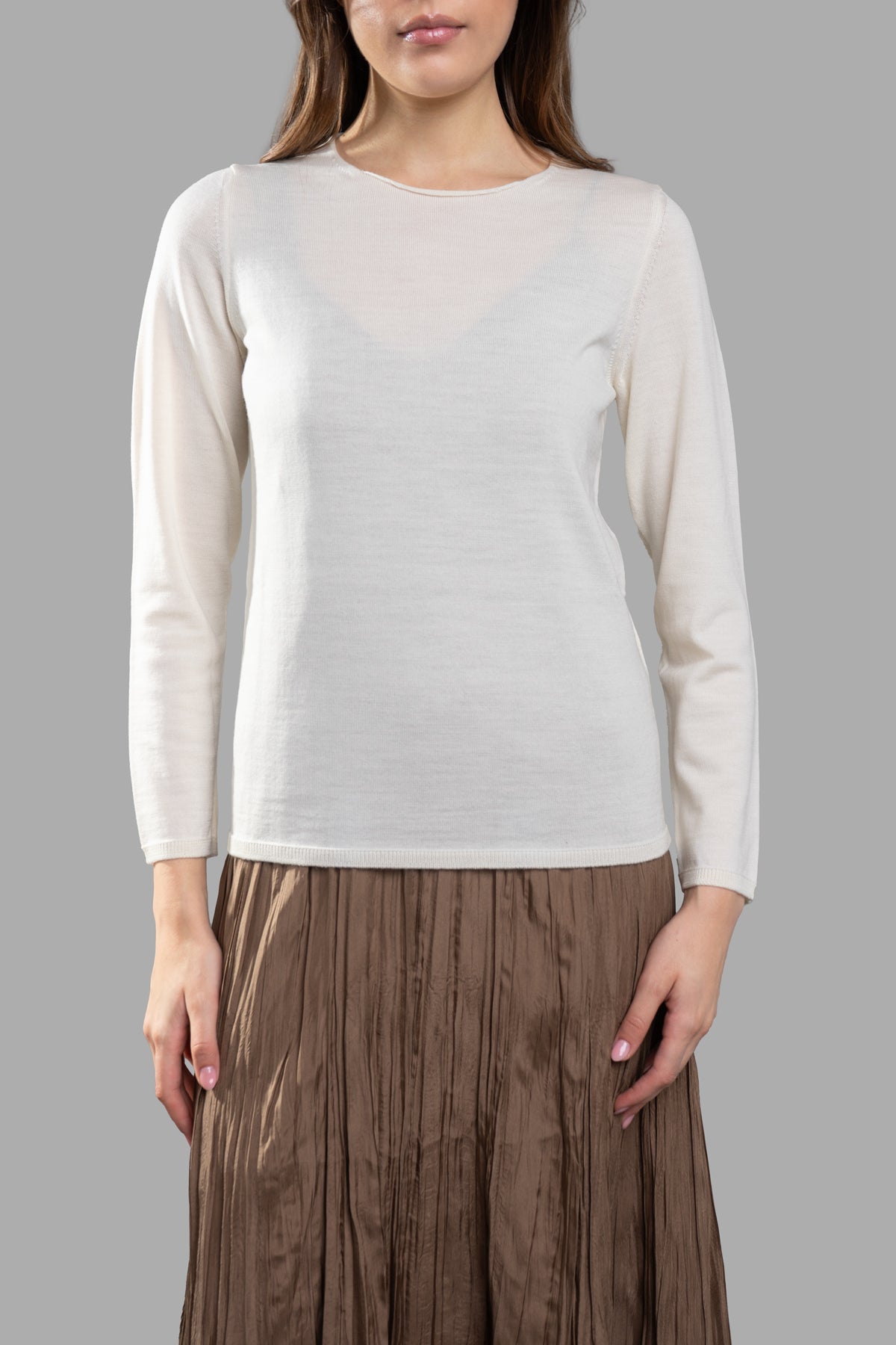 Comme des Garçons Fine-Knit Jumper in ecru, showcasing a classic round-neck design and fine wool texture, on-model.