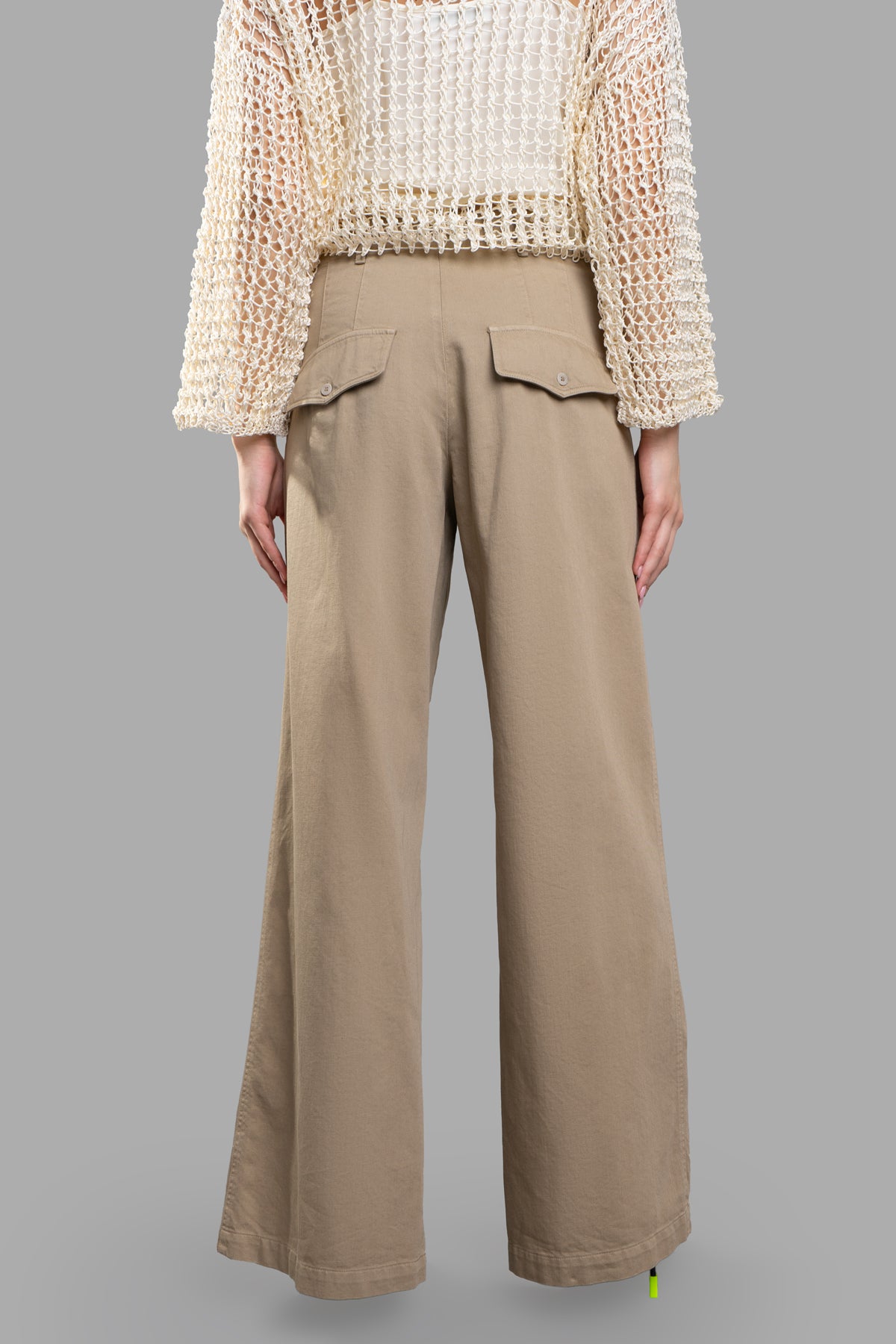 Gentry Portofino Denim Palazzo Pants in beige, showcasing back pockets and high-waisted design for elegant movement.