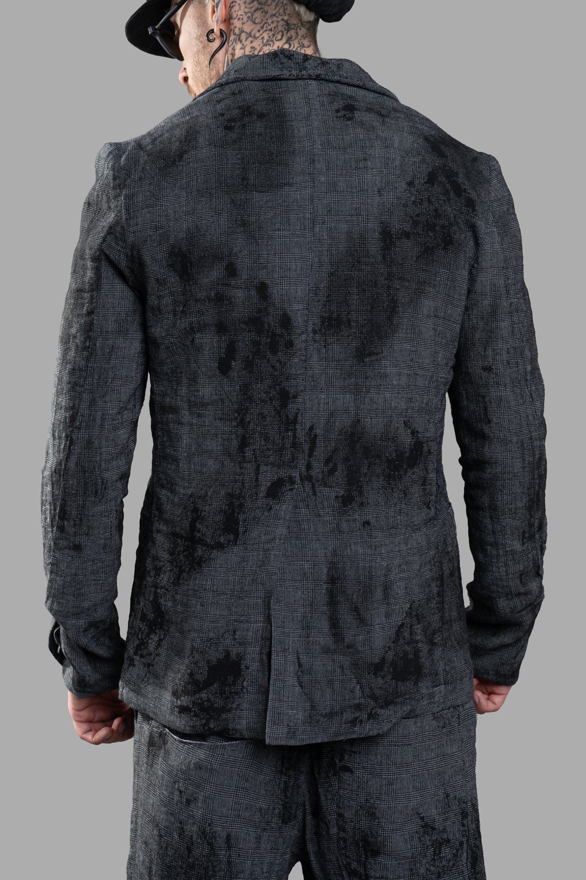 Marc Point Single-breasted Linen Blazer shown from the back, featuring a textured grey fabric with an abstract pattern.