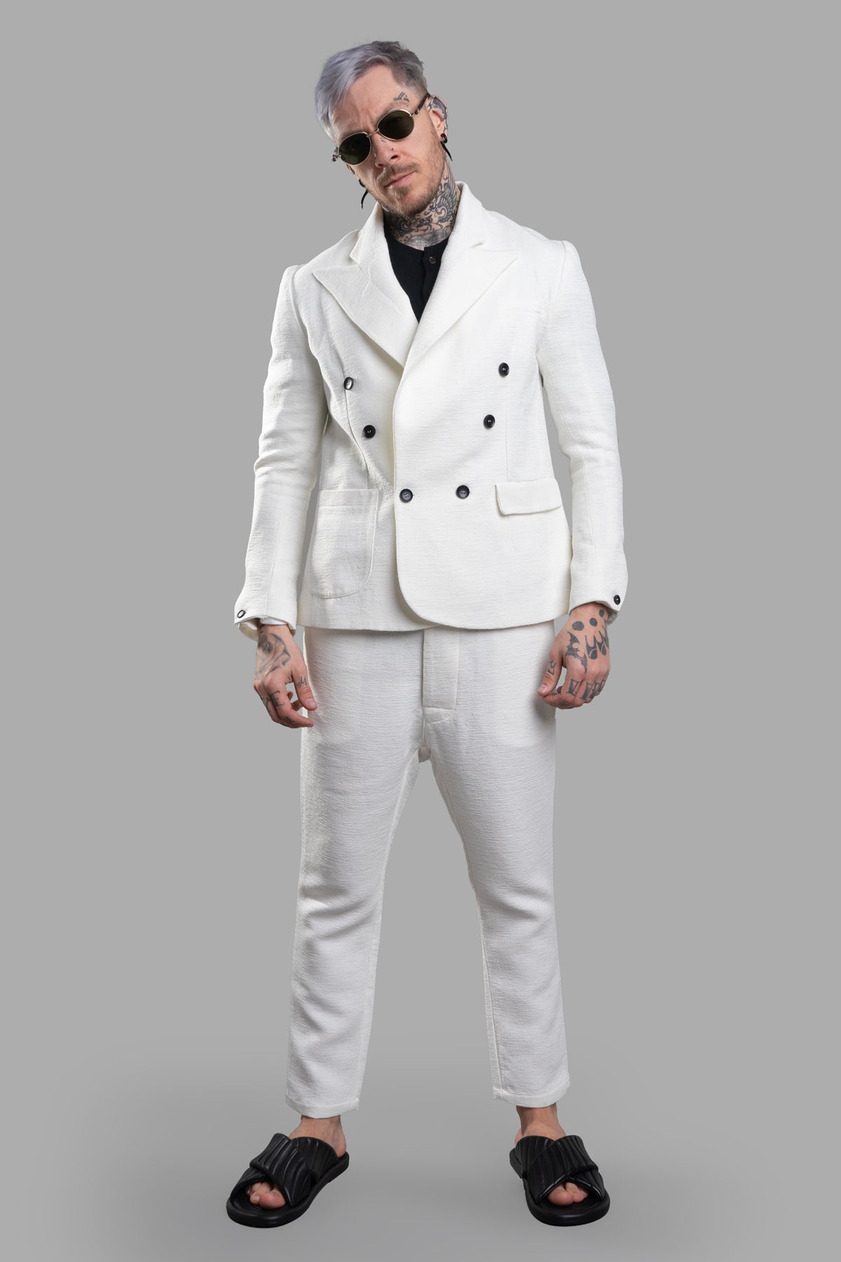 Marc Point Double-breasted Blazer on model, front view, white with wide peaked lapels and button cuffs.