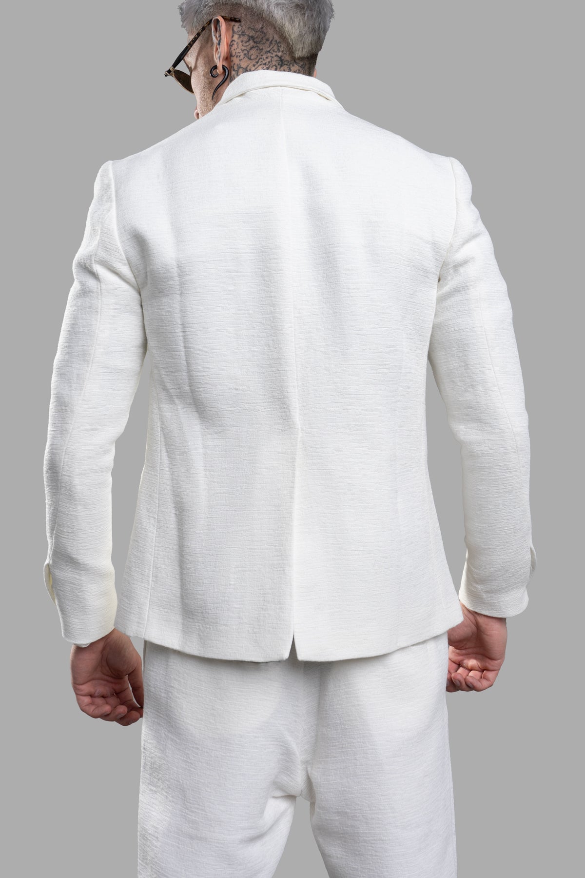 Marc Point Double-breasted Blazer in white, featuring a textured weave, wide peaked lapels, and stylish button cuffs.
