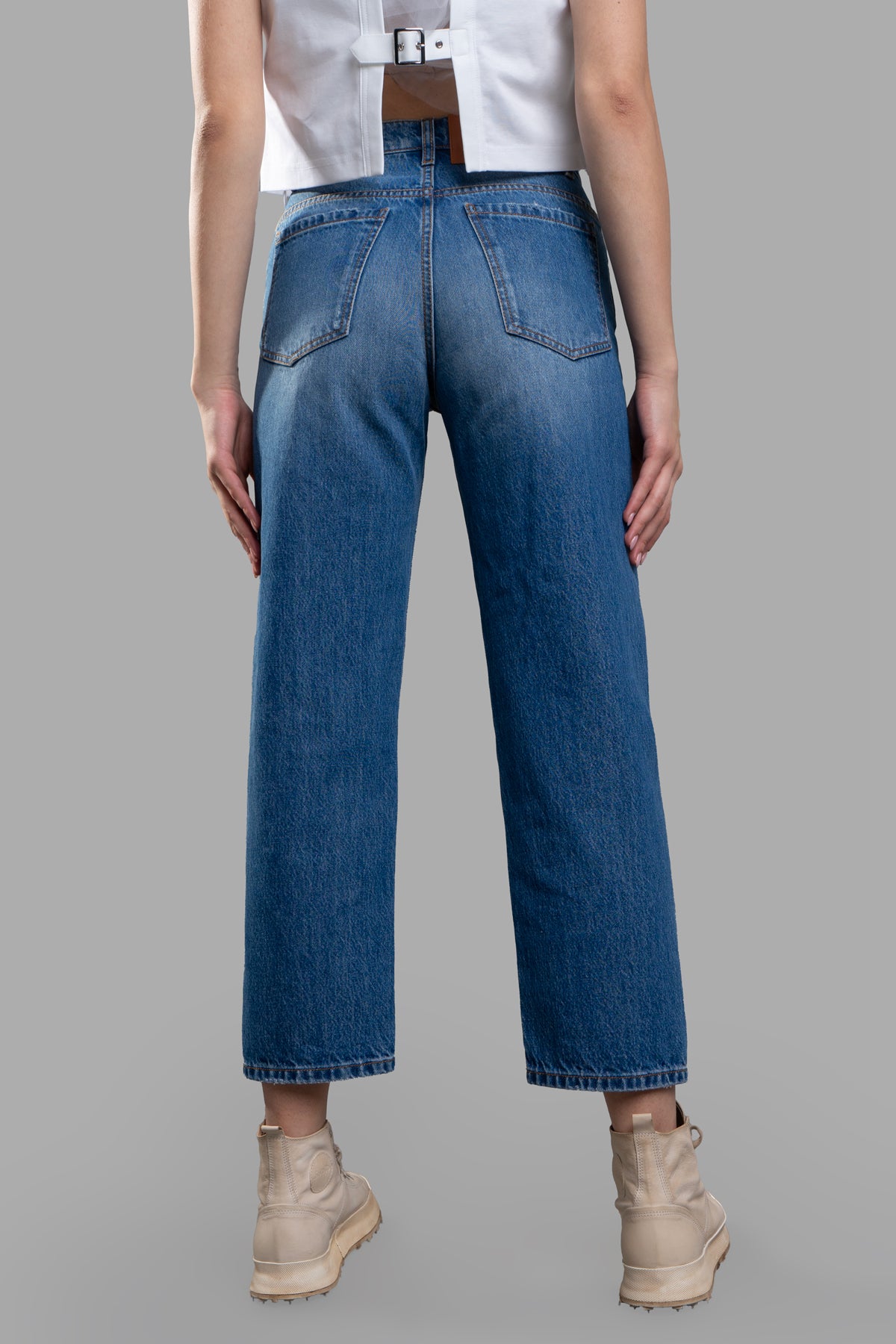 MSGM Cropped Wide-leg Jeans featuring a high waist and classic 5-pocket design, shown from the back in blue denim.