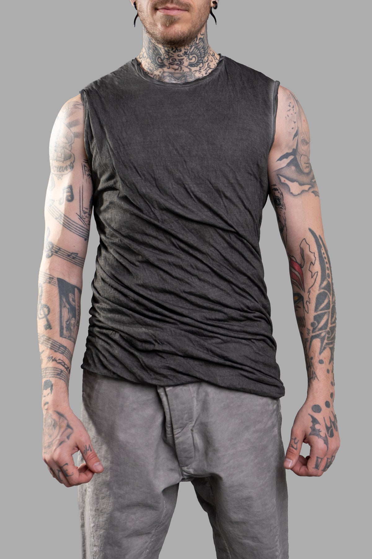 MD 75 Draped Tank Top in grey, showcasing a stylish sleeveless design and lightweight cotton jersey fabric on model.