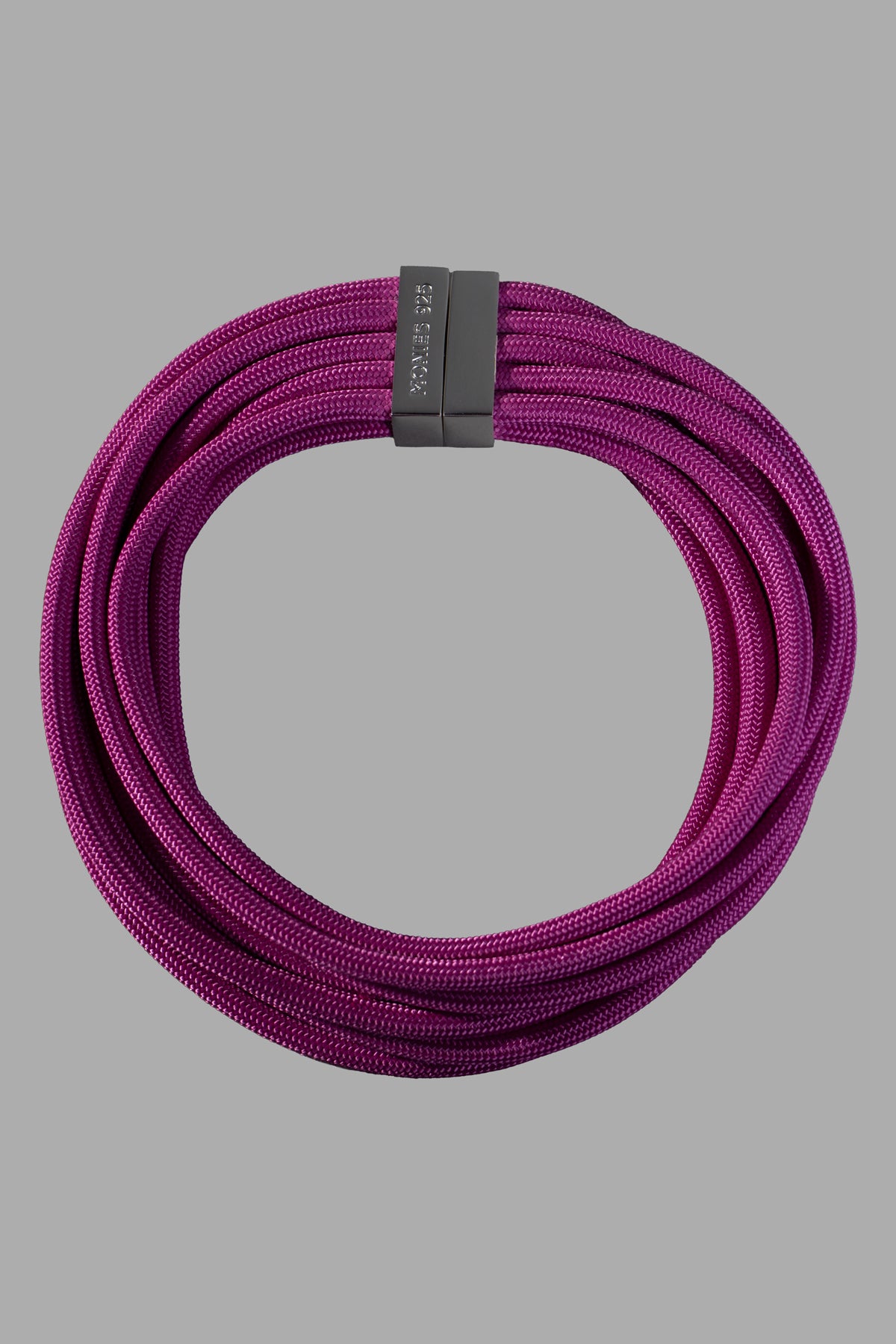 Monies Pink Infini Necklace close-up, featuring a purple cord with a magnetic silver lock, 41 cm length.