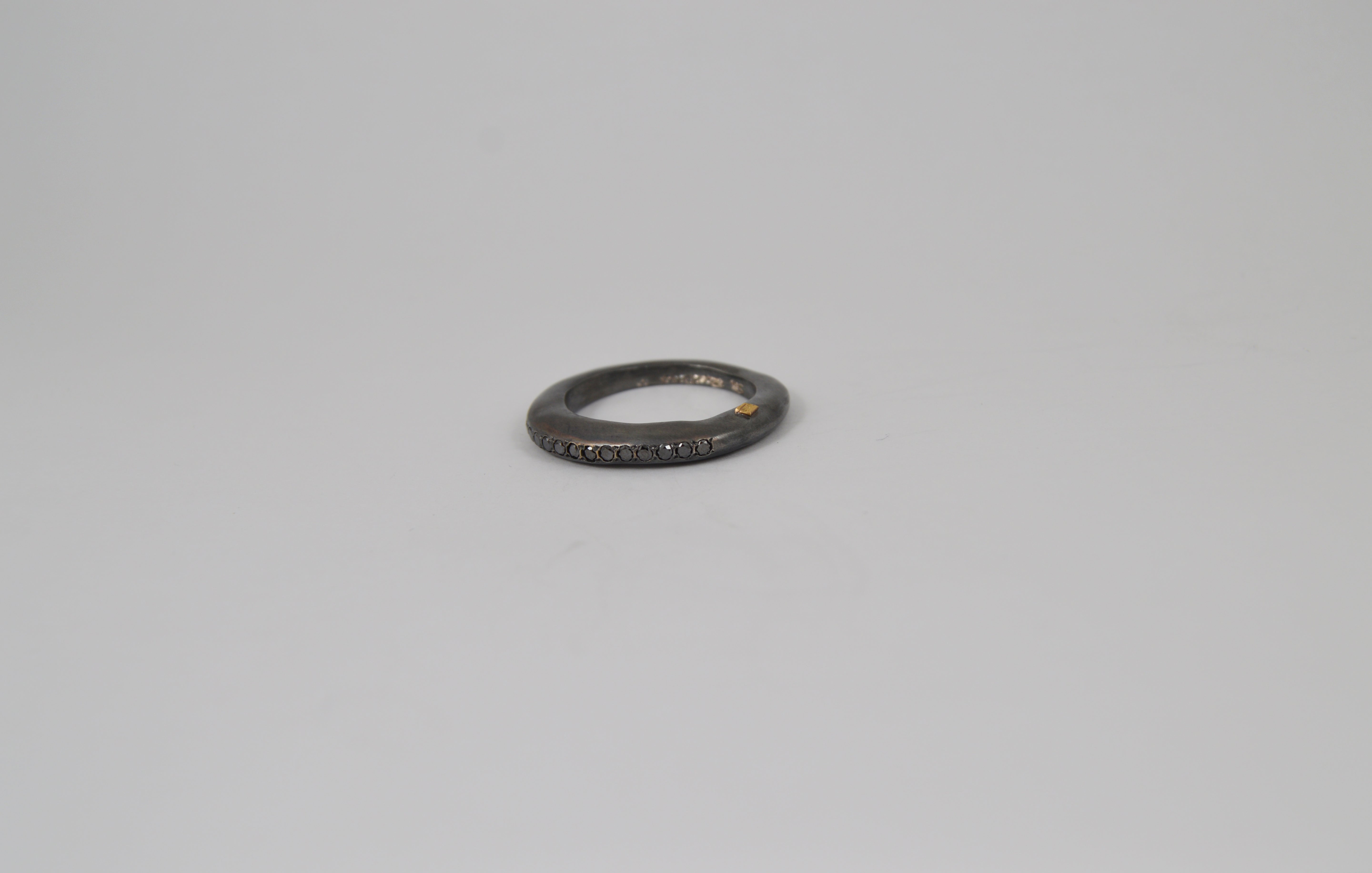 Rosa Maria Hayet Ring, front view, showcasing raw organic sterling silver with black diamonds, embodying a unique design.