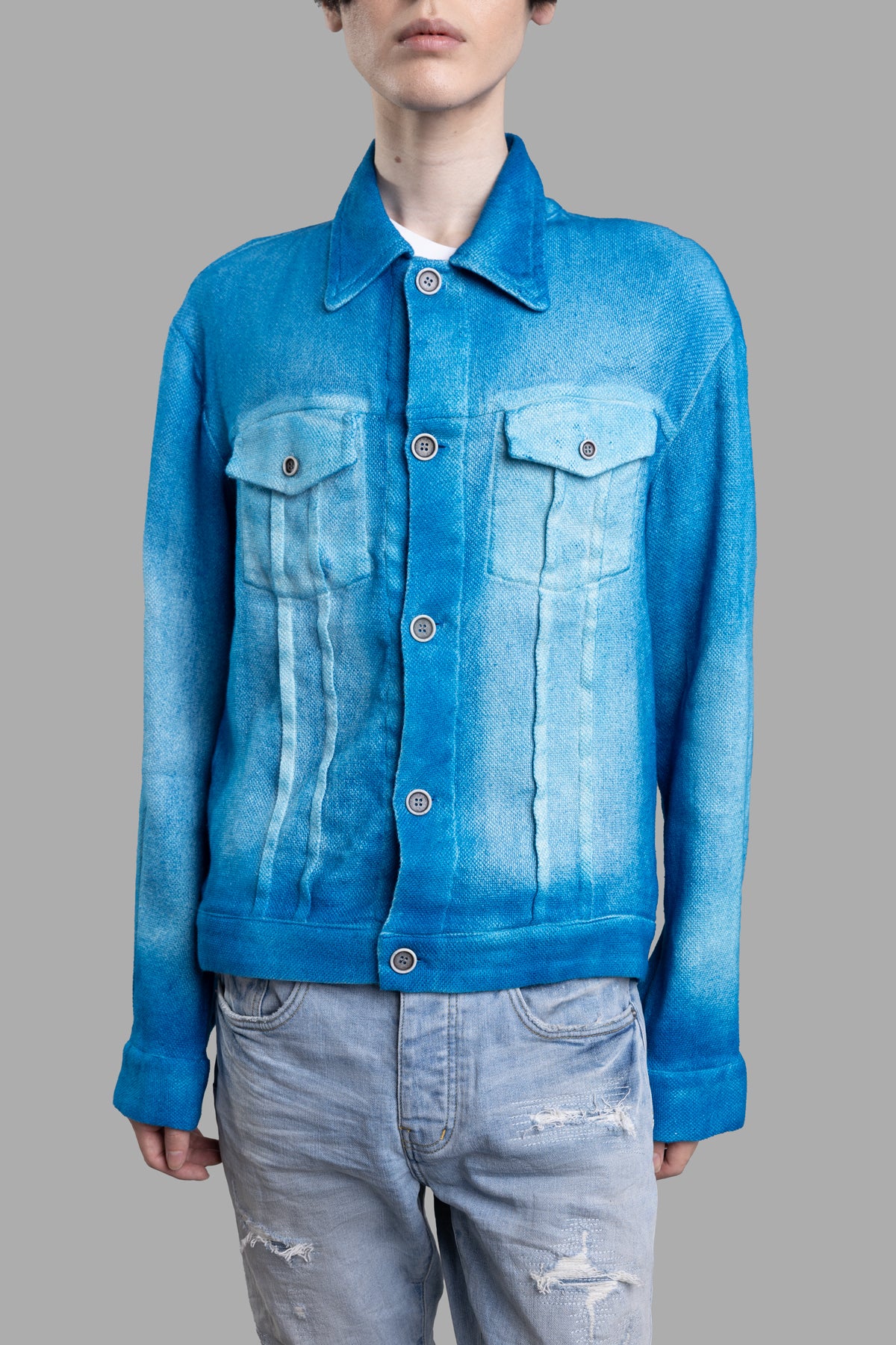 Avant Toi Blue Textured Jacket shown on model, featuring front button closure and unique gradient blue tones.