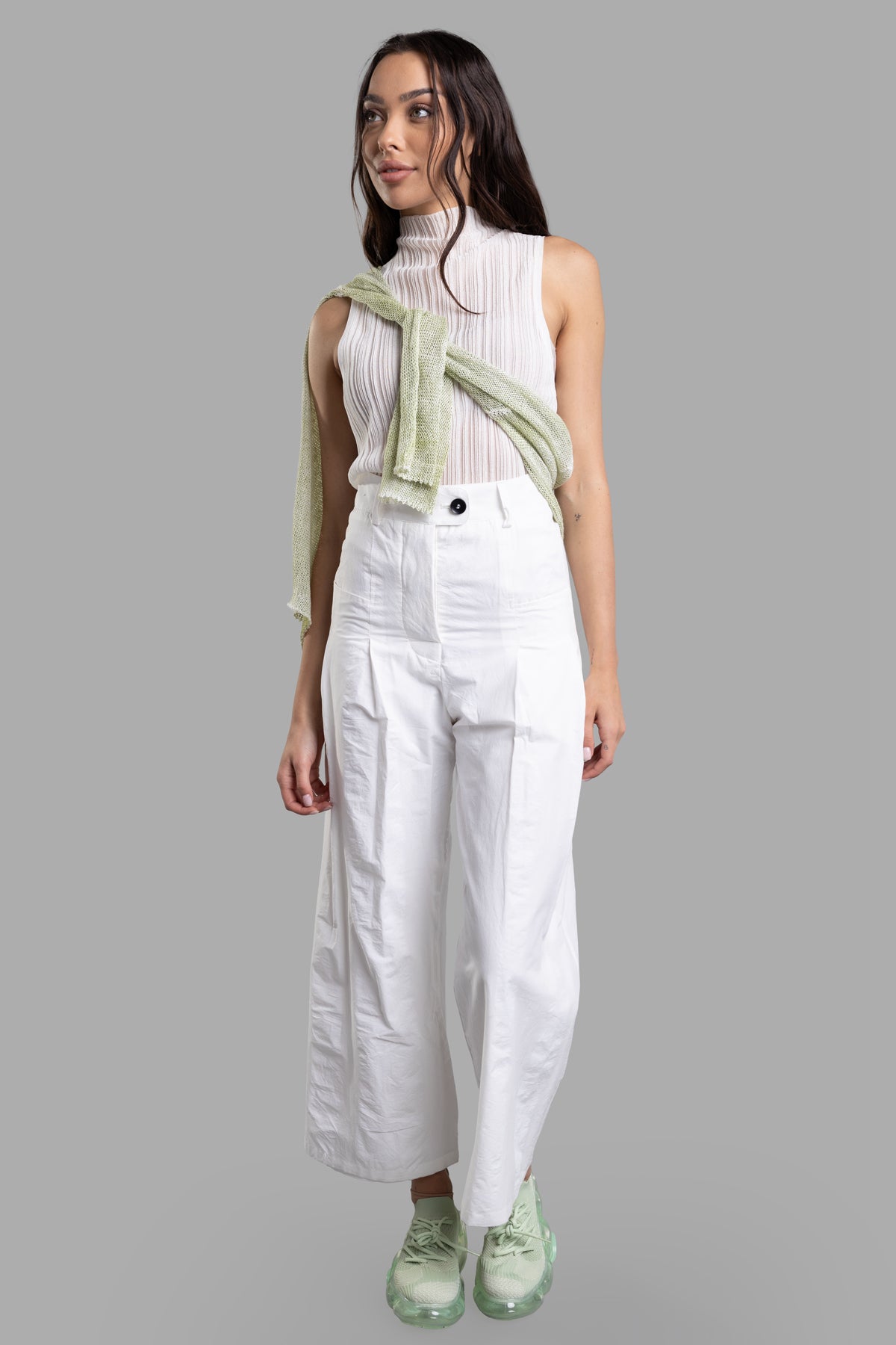 Marc Point Crinkled Cotton Pants on model, high-waisted with belt loops, white, cropped wide leg, stylish button detail.