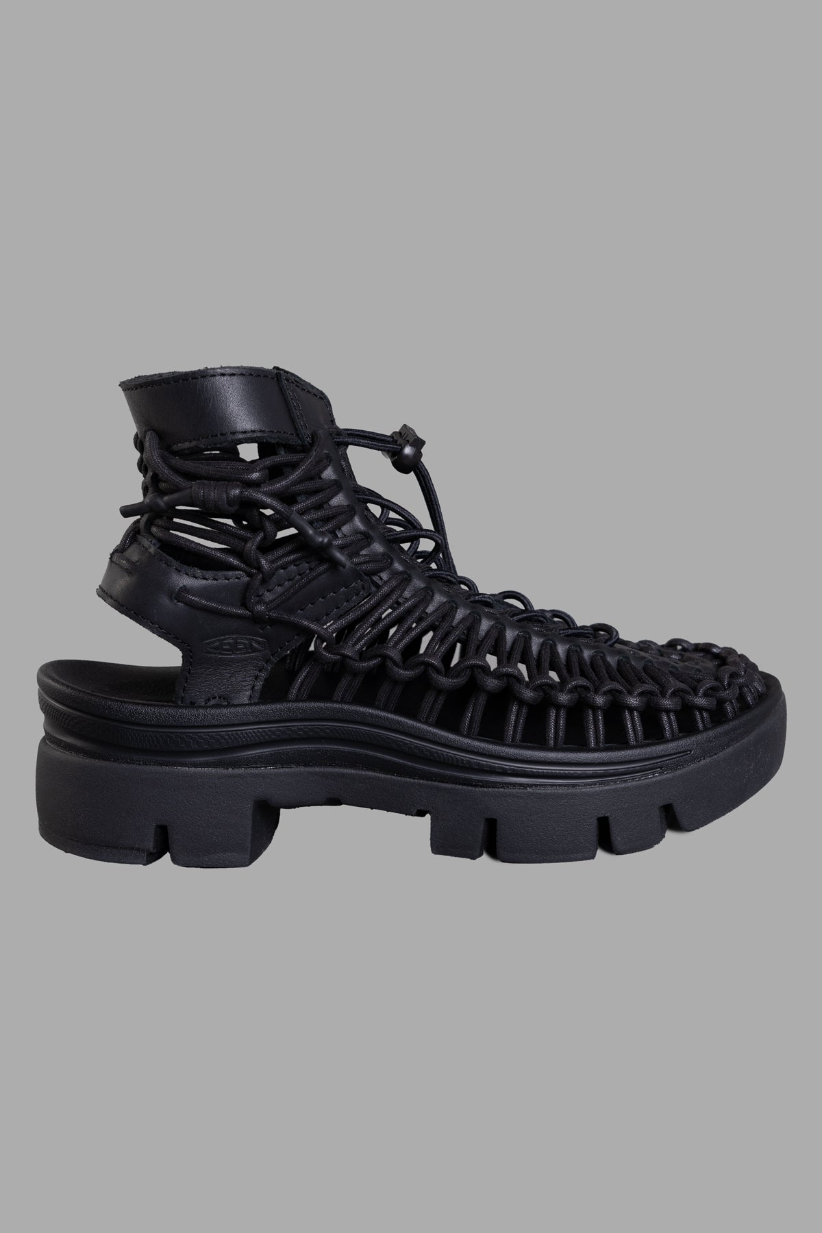 Noir Kei Ninomiya Caged Platform Shoes, side view highlighting intricate caged design with chunky sole, image 1.