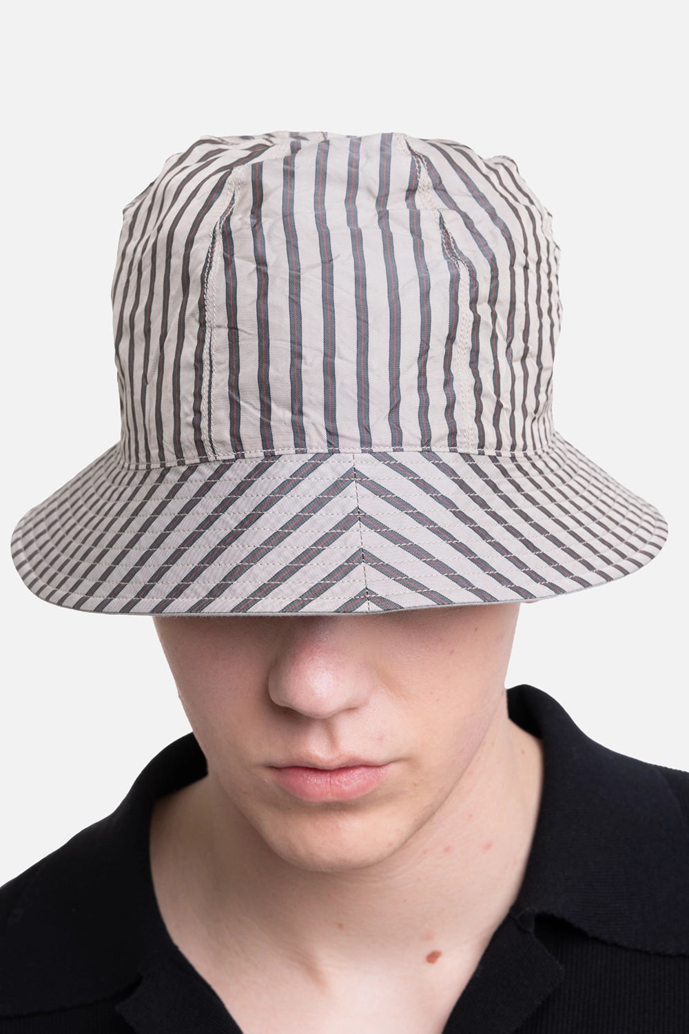 KIJIMA TAKAYUKI men's bucket hat in black/gray, front view with soft crown and wide stitched brim