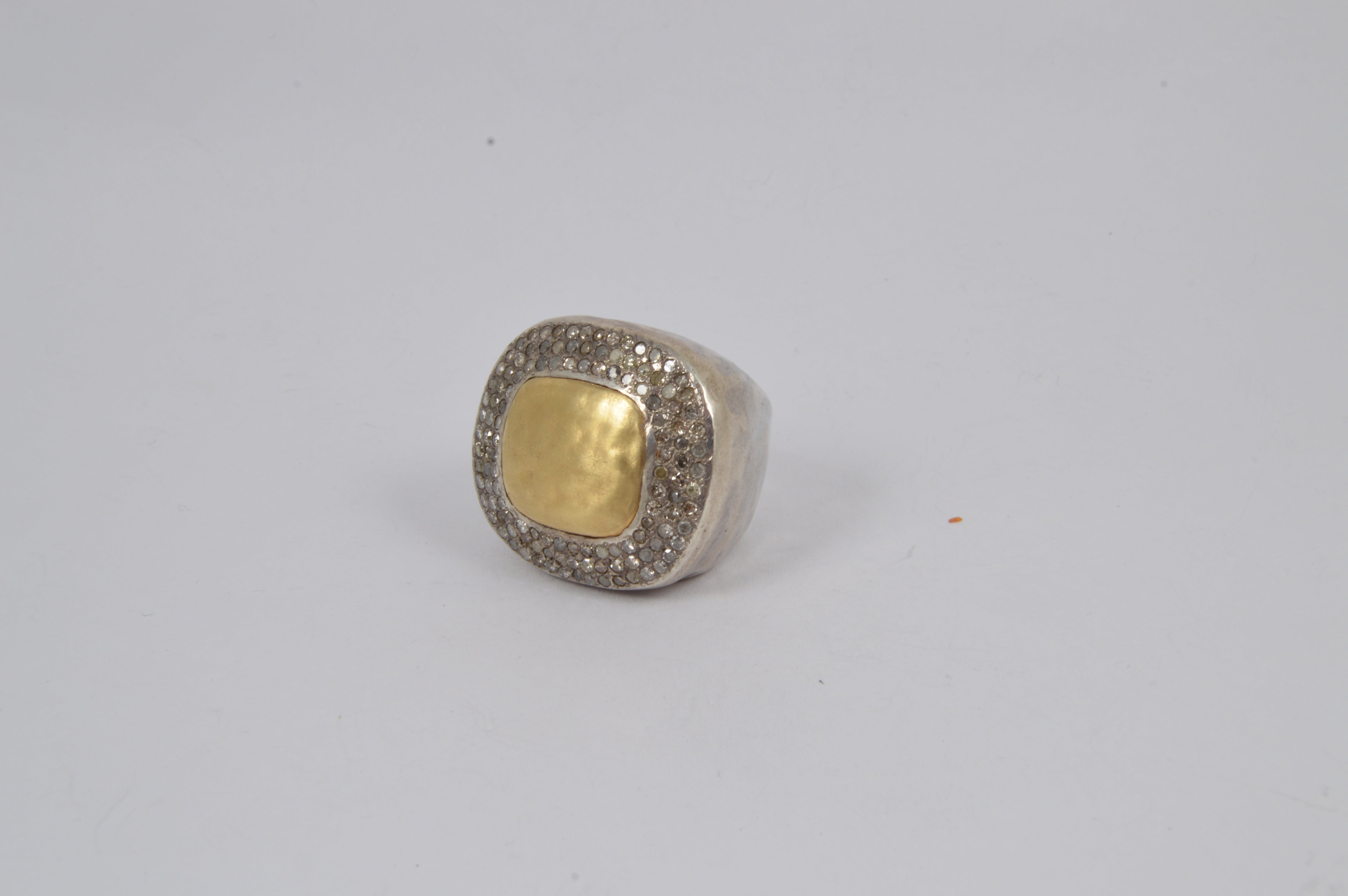 Rosa Maria Odeya Ring featuring a front view of organic shape in sterling silver, yellow gold, and diamonds.