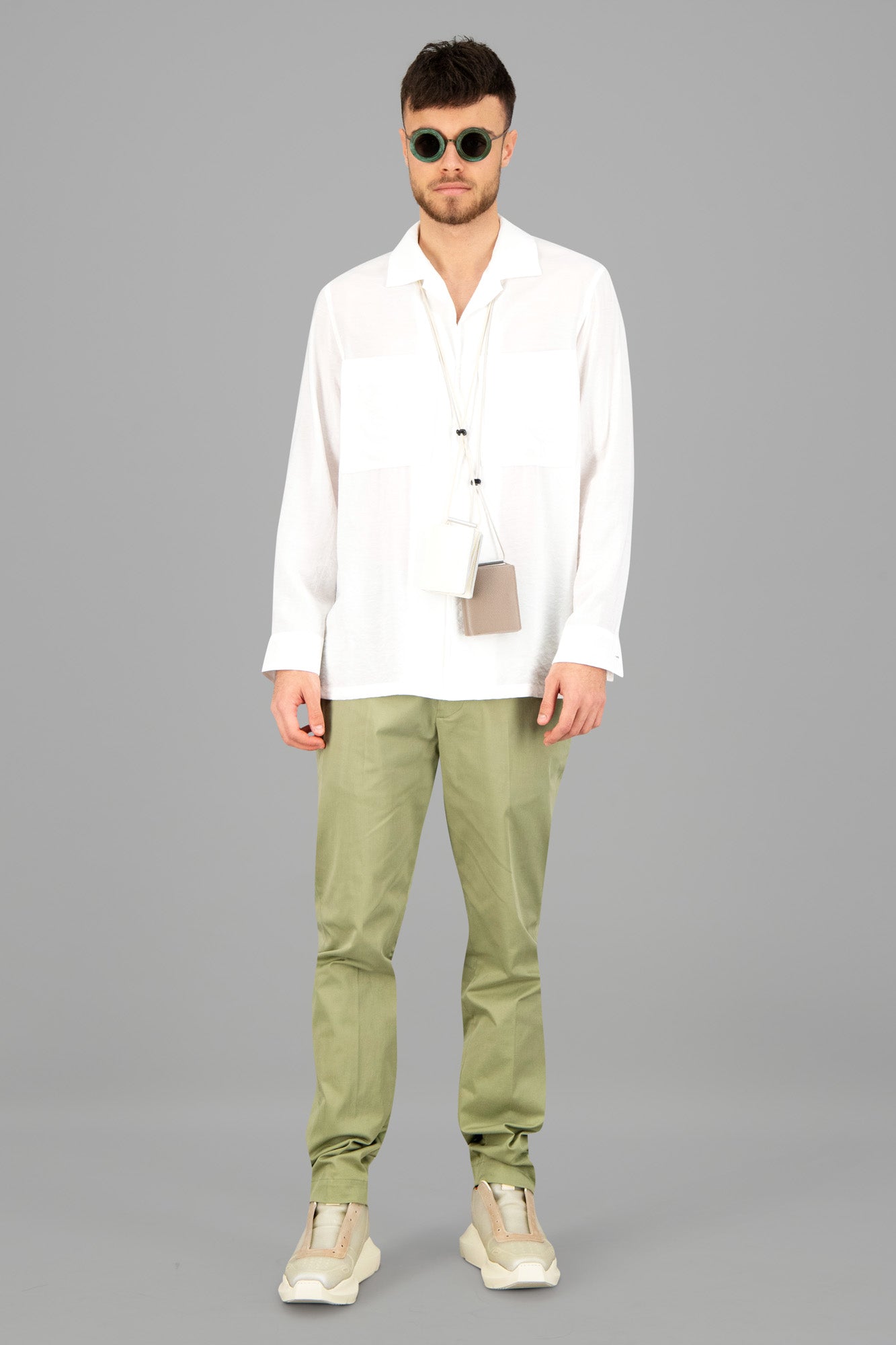 AION Olive Green Straight-Leg Trousers on model, front view, showcasing elasticated waistband and casual style.