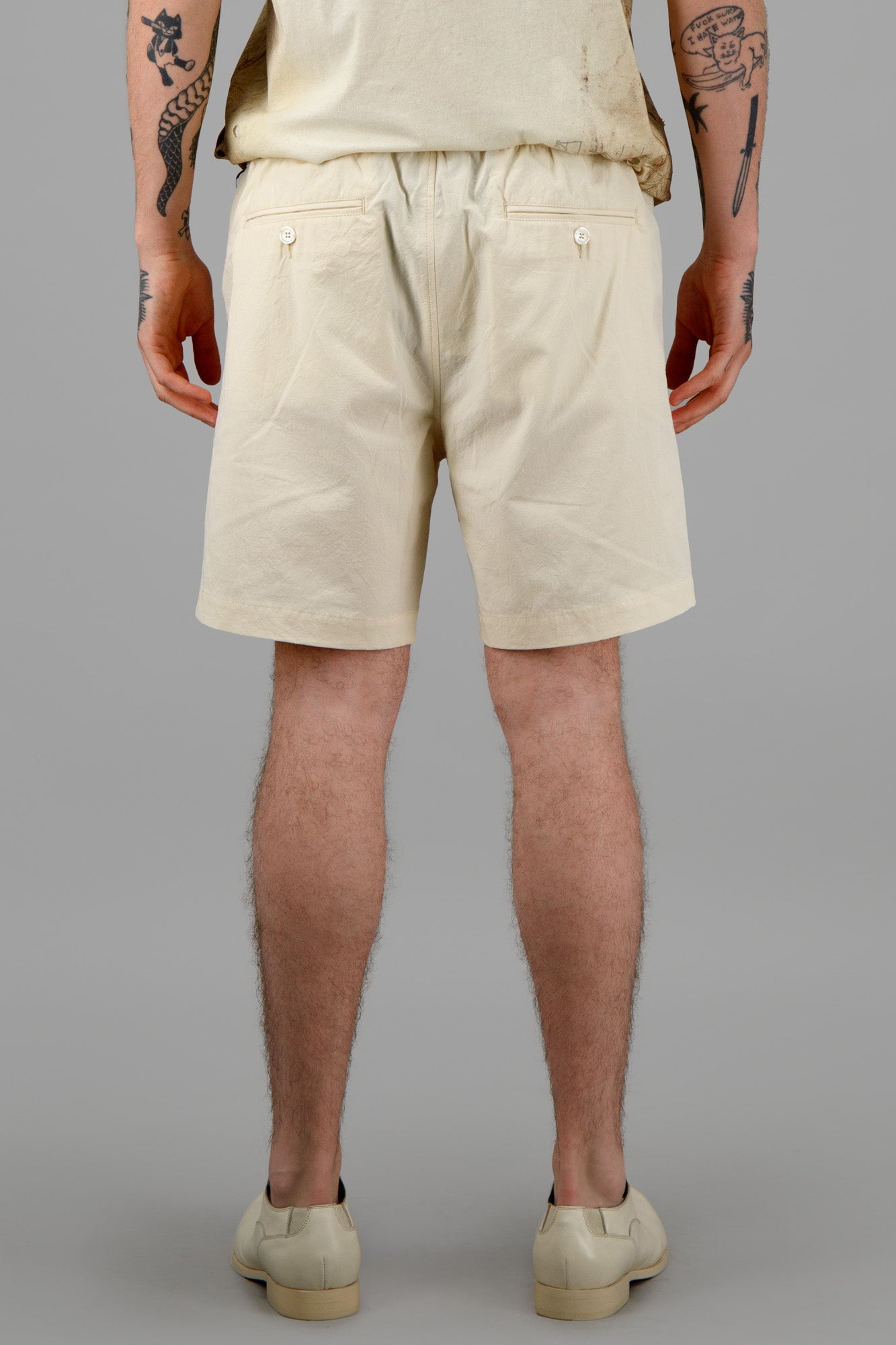 Orlebar Brown Sand-Colored Shorts in White Sand, showcasing rear view with part-stretch waistband and breathable cotton.