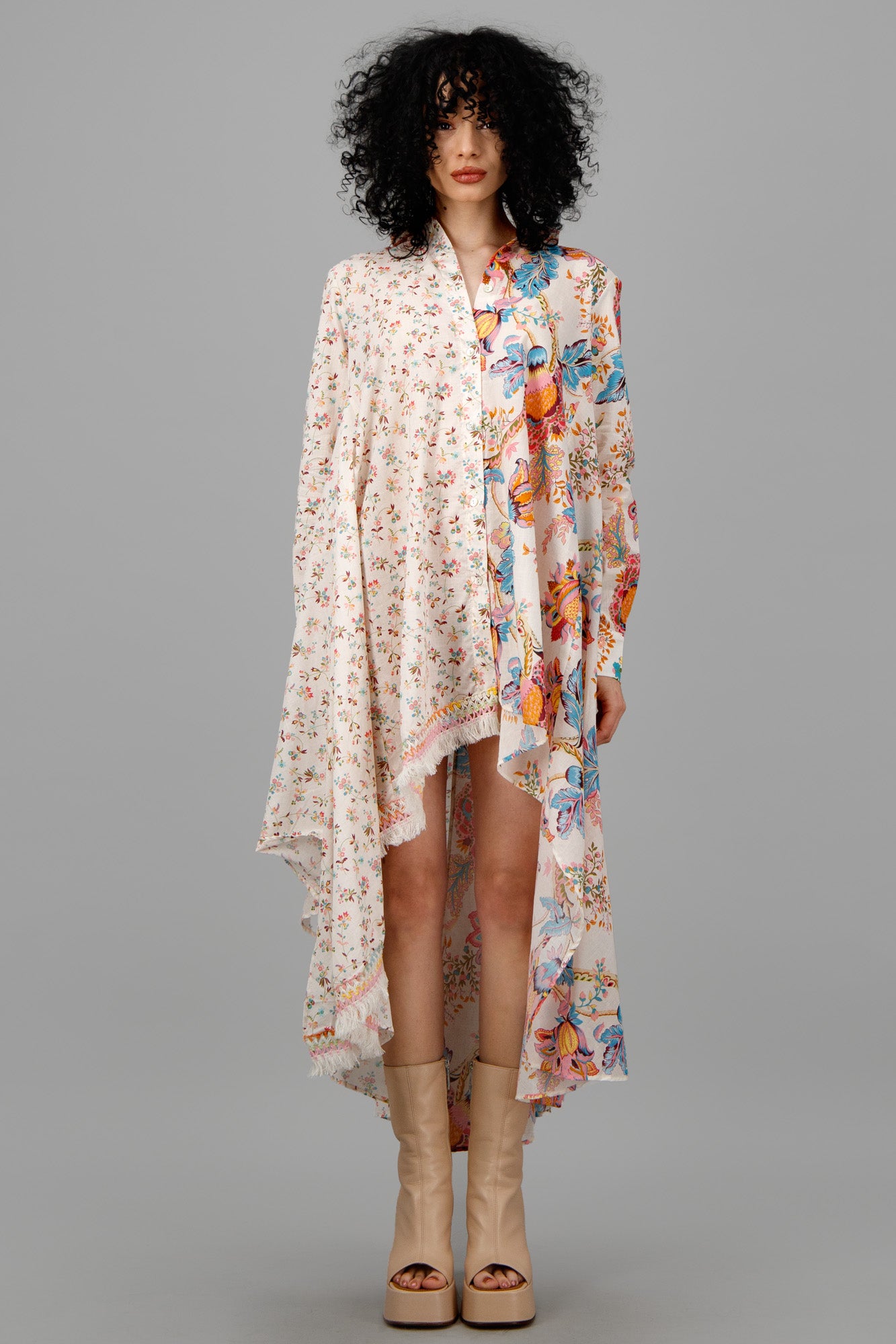 Anjuna Double-Print Asymmetric Dress on model, showcasing flowy fabric and playful floral prints with dramatic hem.
