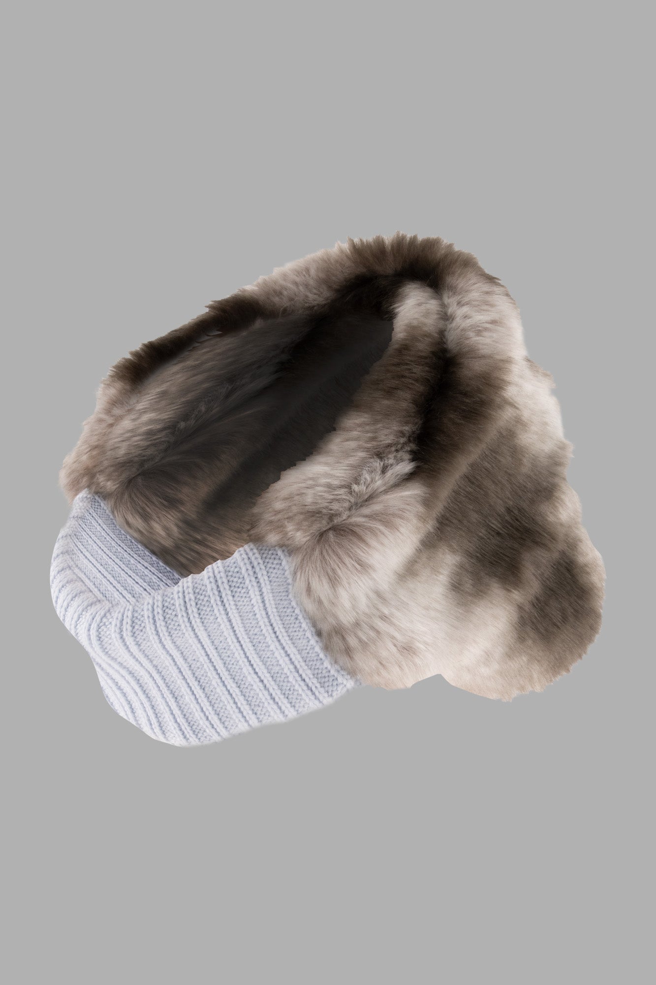 Kijima Takayuki Ear Headband in Blue featuring soft wool knit and luxurious synthetic fur, showing front angle and texture.