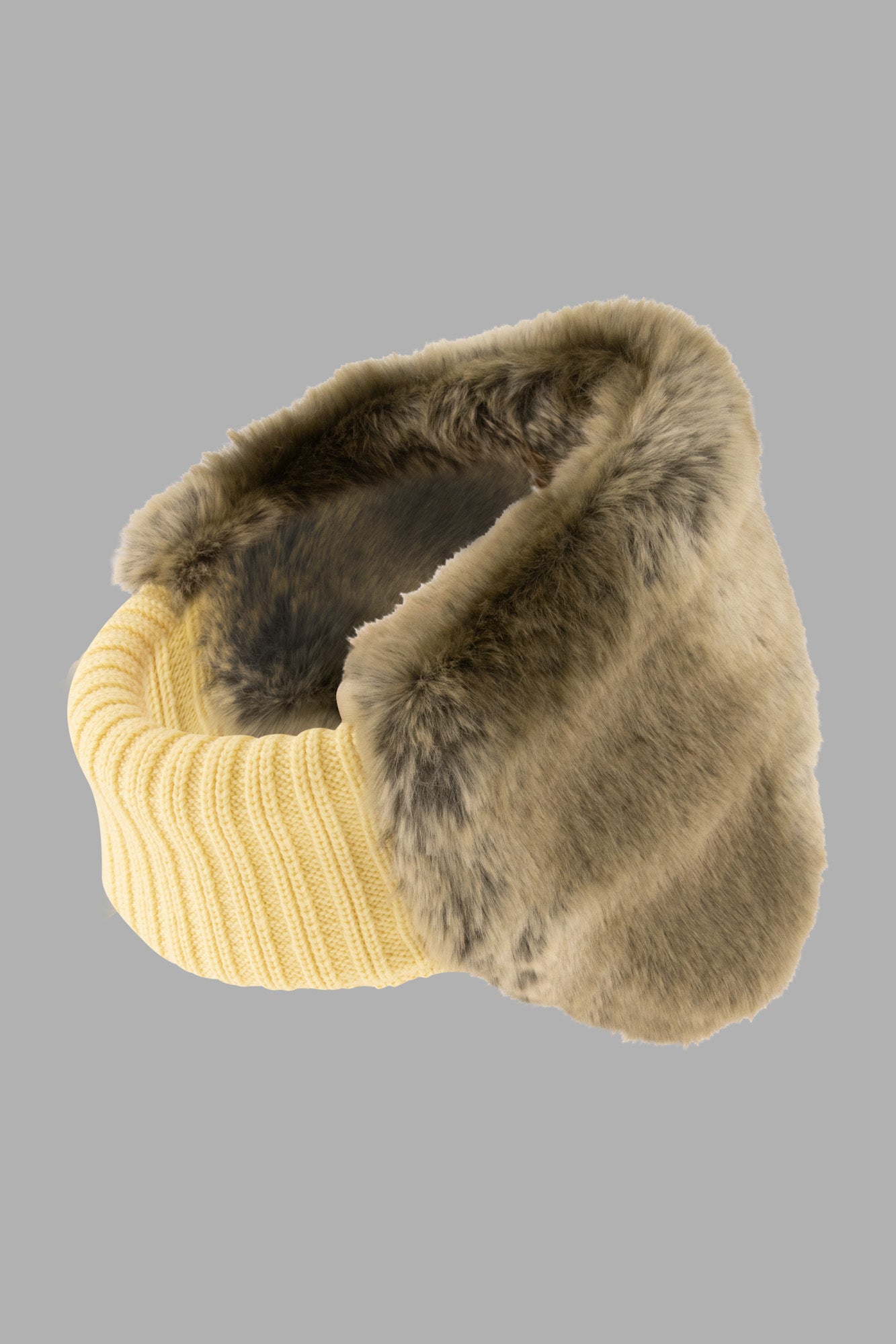 Kijima Takayuki Ear Headband in Yellow showcasing soft wool knit and luxurious synthetic fur, highlighting texture and warmth.