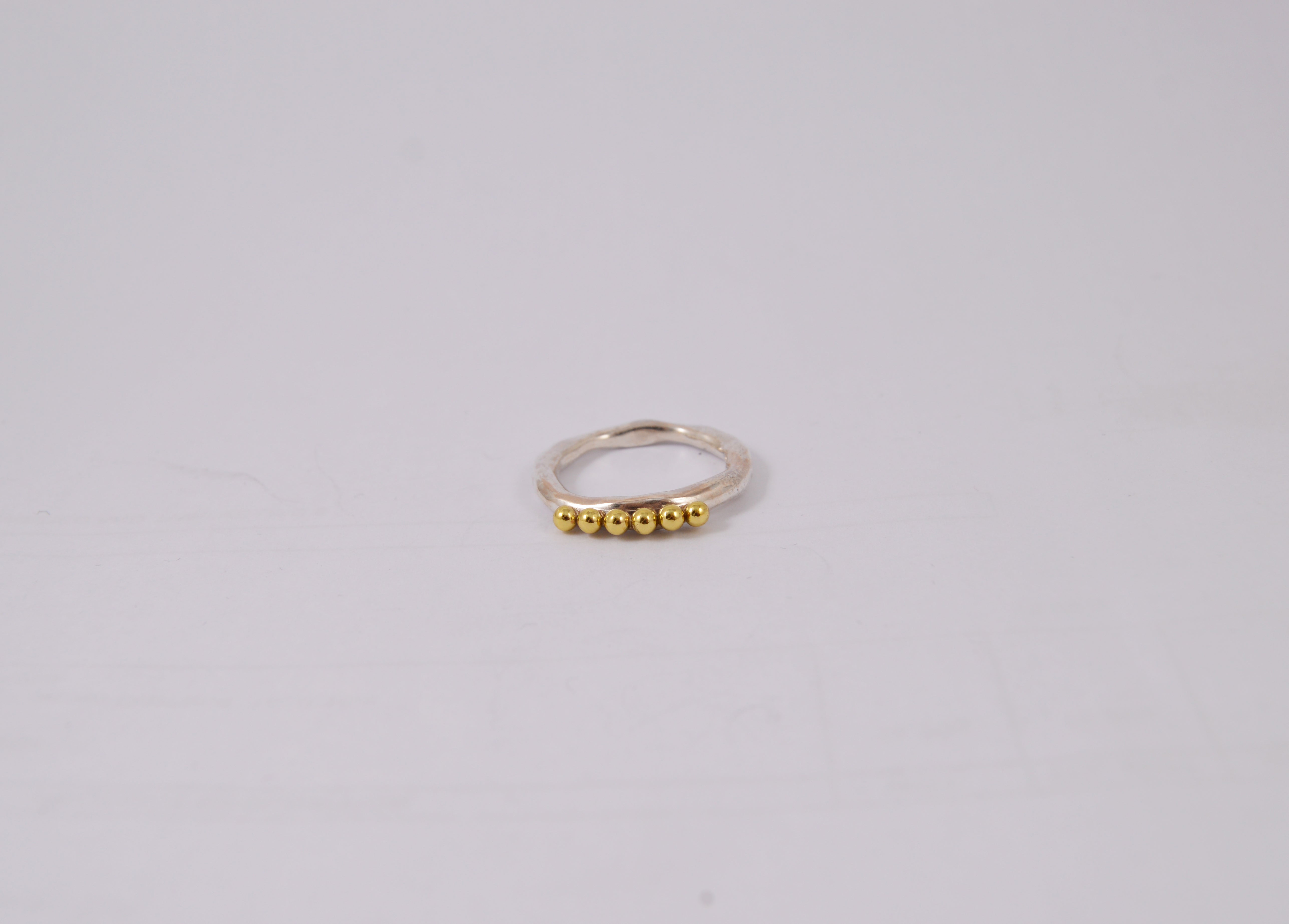 Rosa Maria Poline Copper & Silver Ring, front view, handcrafted with organic shape and copper bead detailing.