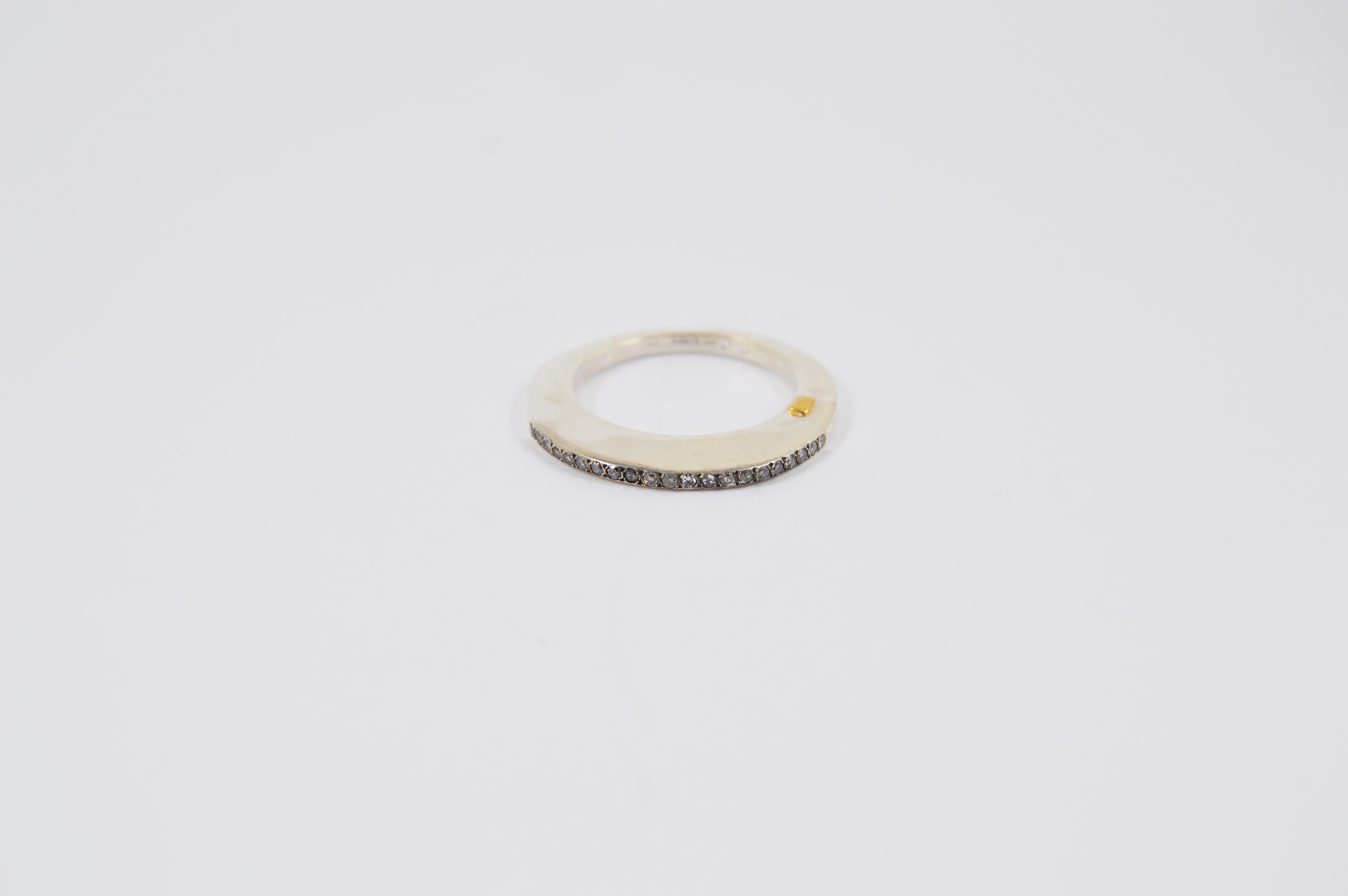 Rosa Maria Poster Ring in silver with icy grey diamonds, showcasing raw organic design on a simple white background.