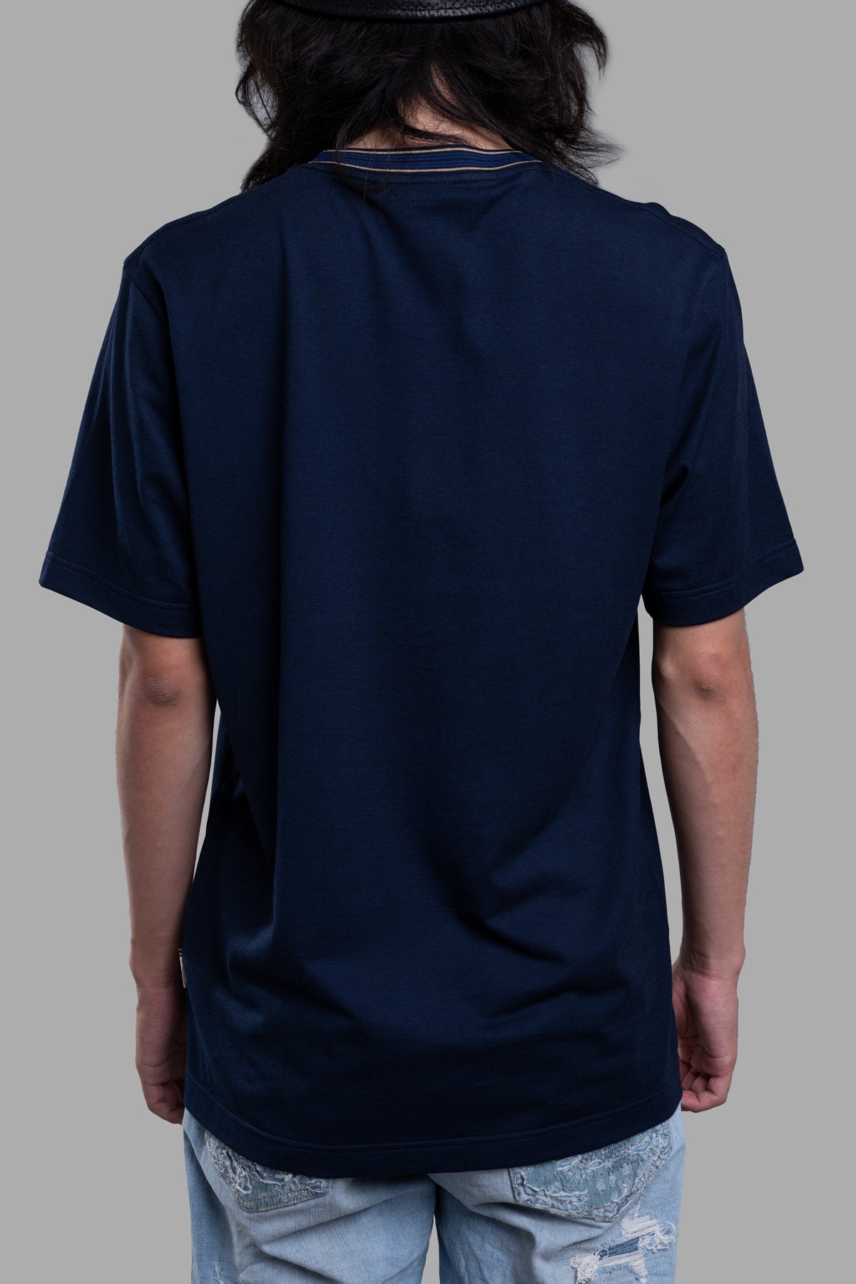 Orlebar Brown Striped Neckline T-shirt displayed from the back, featuring a deep navy color and contrast striped neckline.