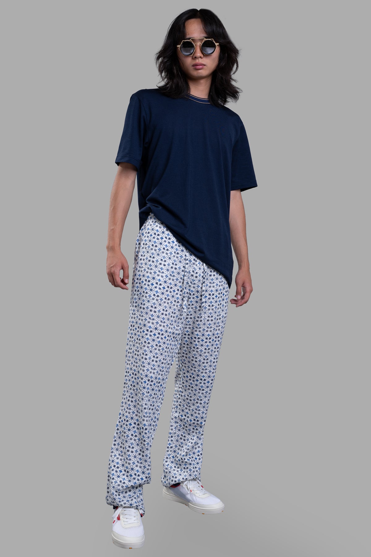 Orlebar Brown Relaxed-Fit Lounge Trousers, 'Fiore' print, front view on model, airy fabric, part-elasticated waist.