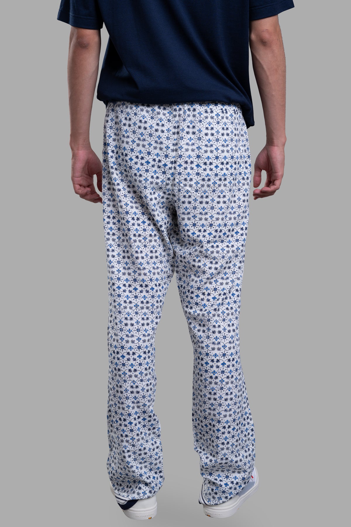 Orlebar Brown Relaxed-Fit Lounge Trousers in floral print, showcasing back view with part-elasticated waist and relaxed.