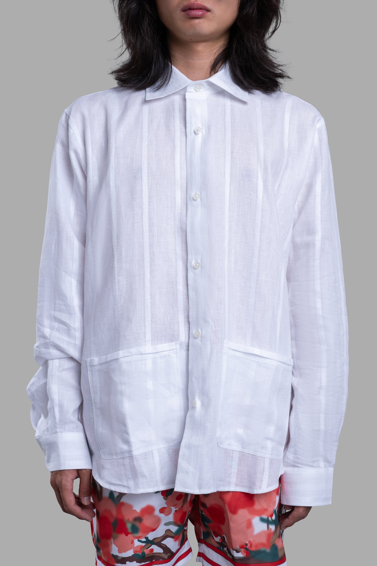 Orlebar Brown Resort Overshirt in white, featuring a soft linen texture, tonal stripes, modern collar, and hip pockets.
