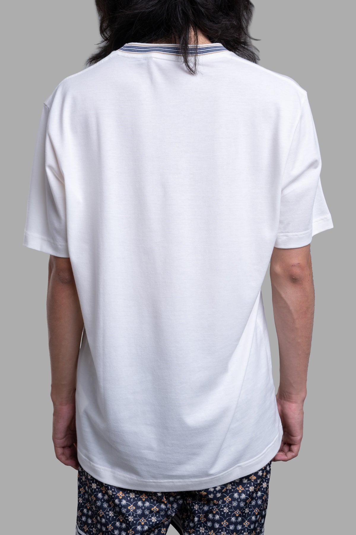 Orlebar Brown Striped Neckline T-shirt viewed from the back, showcasing the ribbed striped neckline detail and relaxed fit.