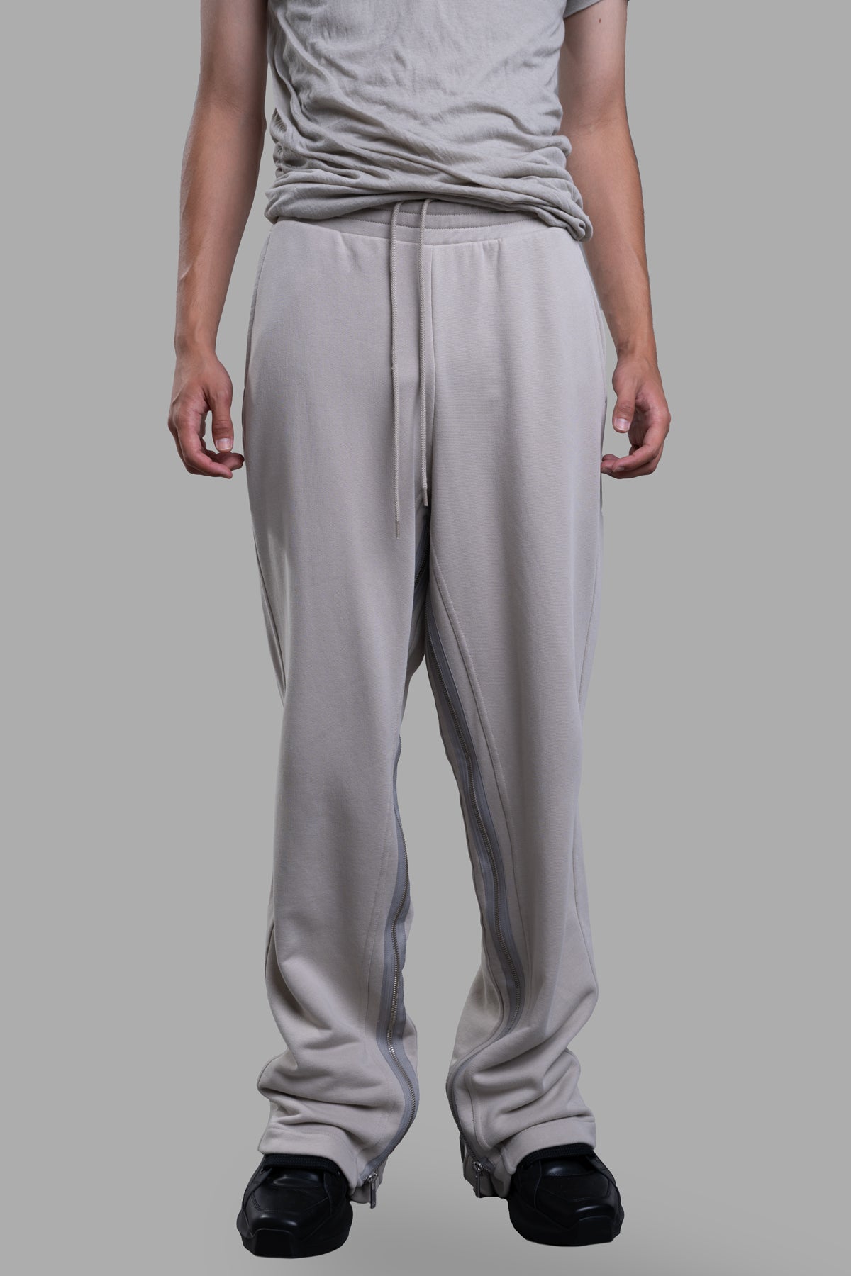 Helmut Lang Gusset Sweatpants in grey, showcasing elasticized waist and full-length zippers for customizable fit.