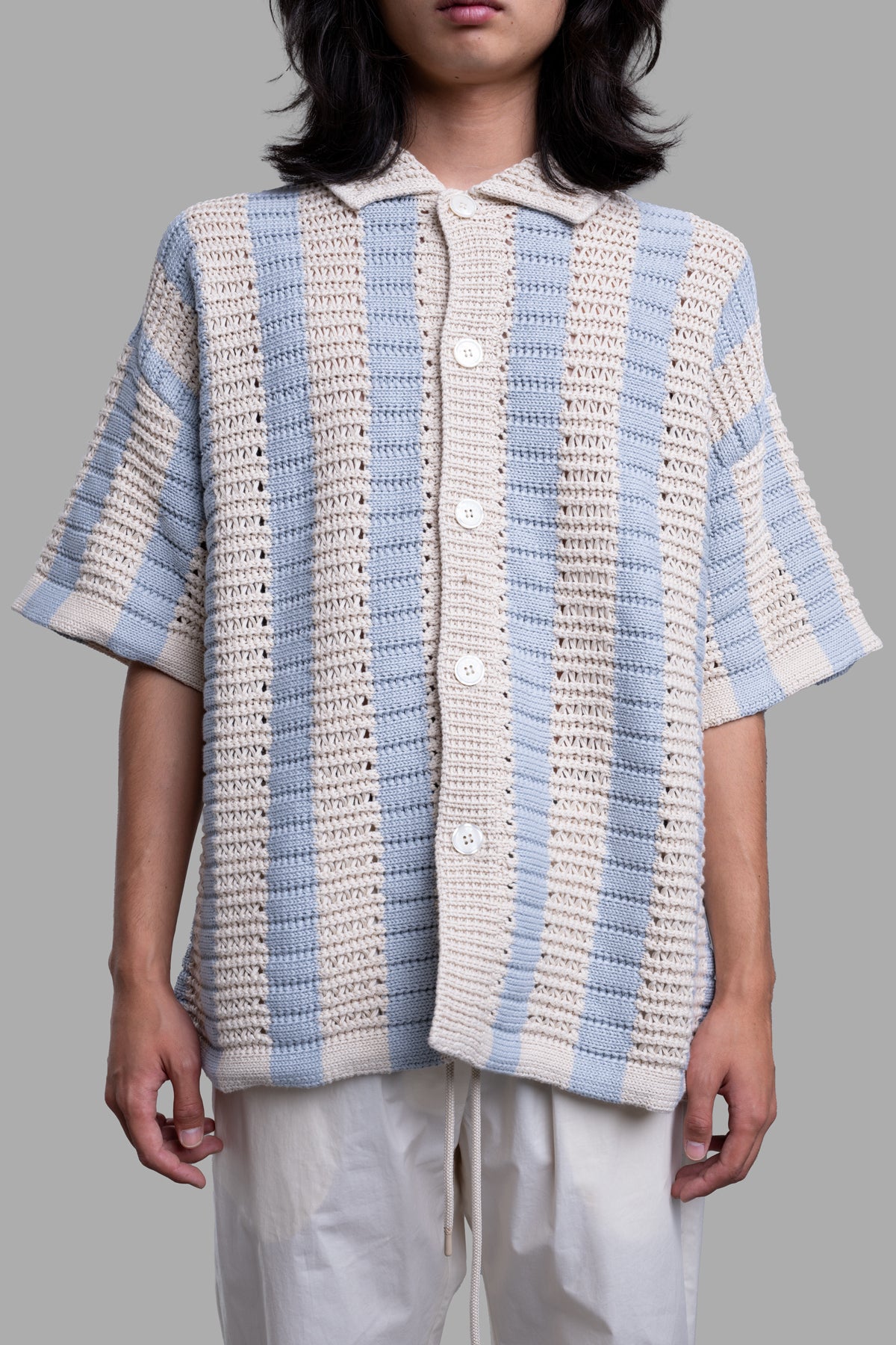 Orlebar Brown Knitted Crochet Shirt in beige and blue, featuring a relaxed fit, button closure, and textured layered design.