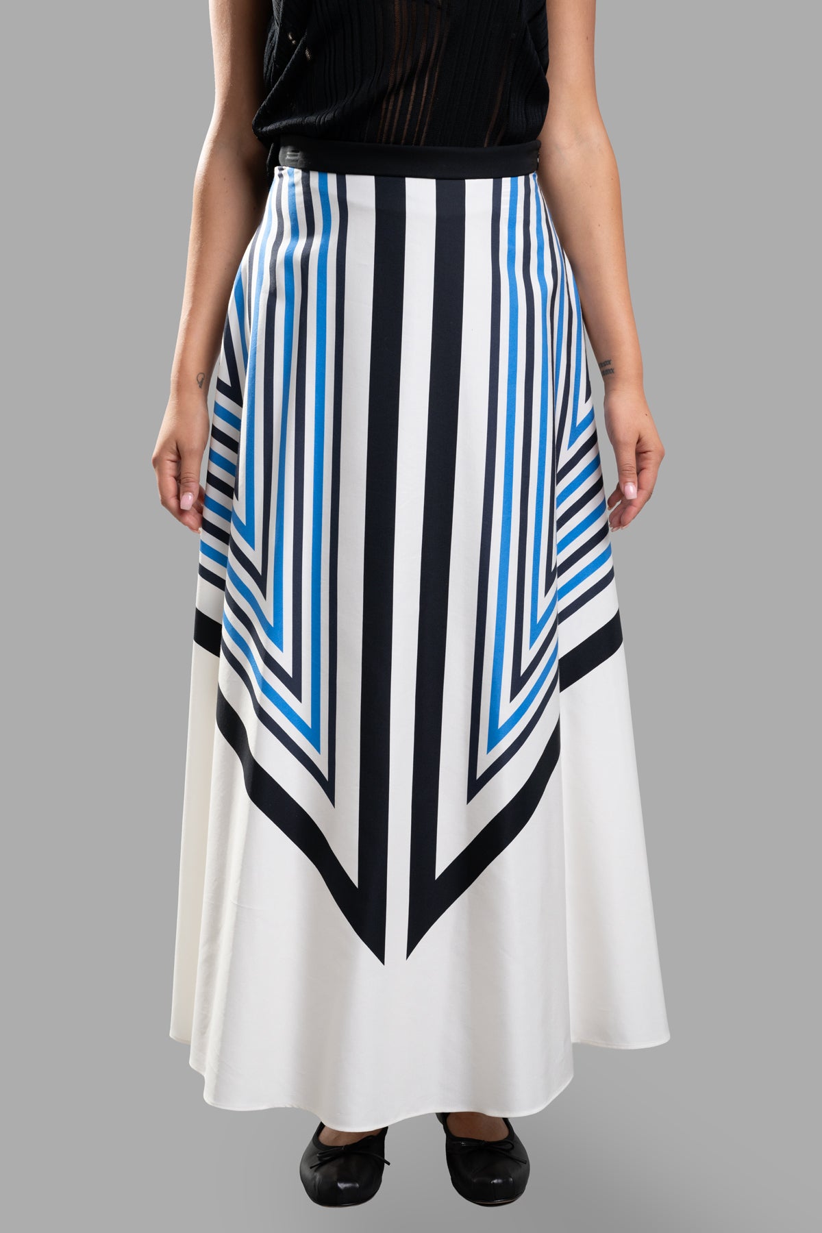 Joseph. Graphic-print Silk Skirt displayed on model, featuring striped graphic design in white and blue with A-line silhouette.