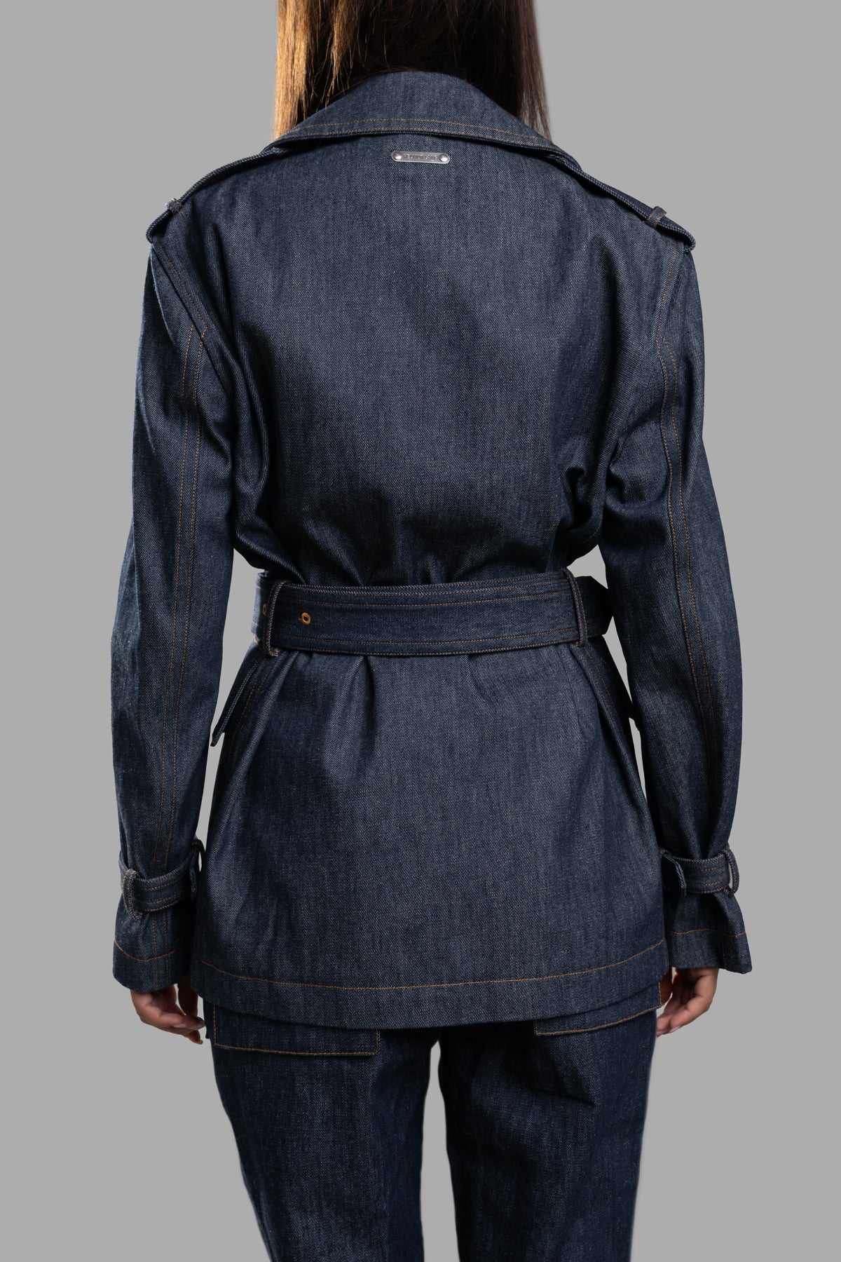 Helmut Lang Denim Trench Jacket showcasing back view with oversized lapels and detachable belt in raw indigo denim.
