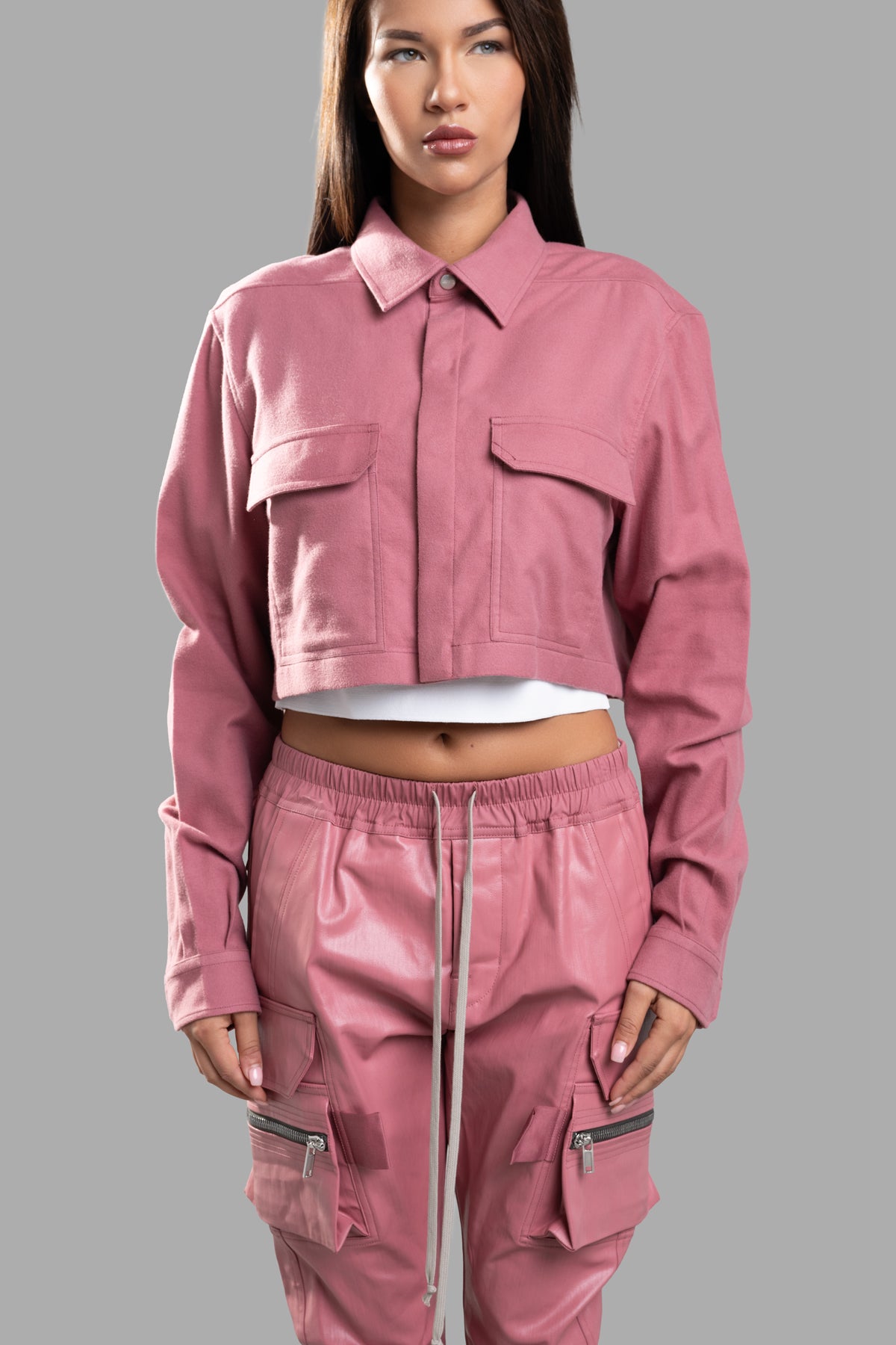Rick Owens Cropped Outershirt in pink, featuring a structured silhouette with snap closures and functional flap pockets.