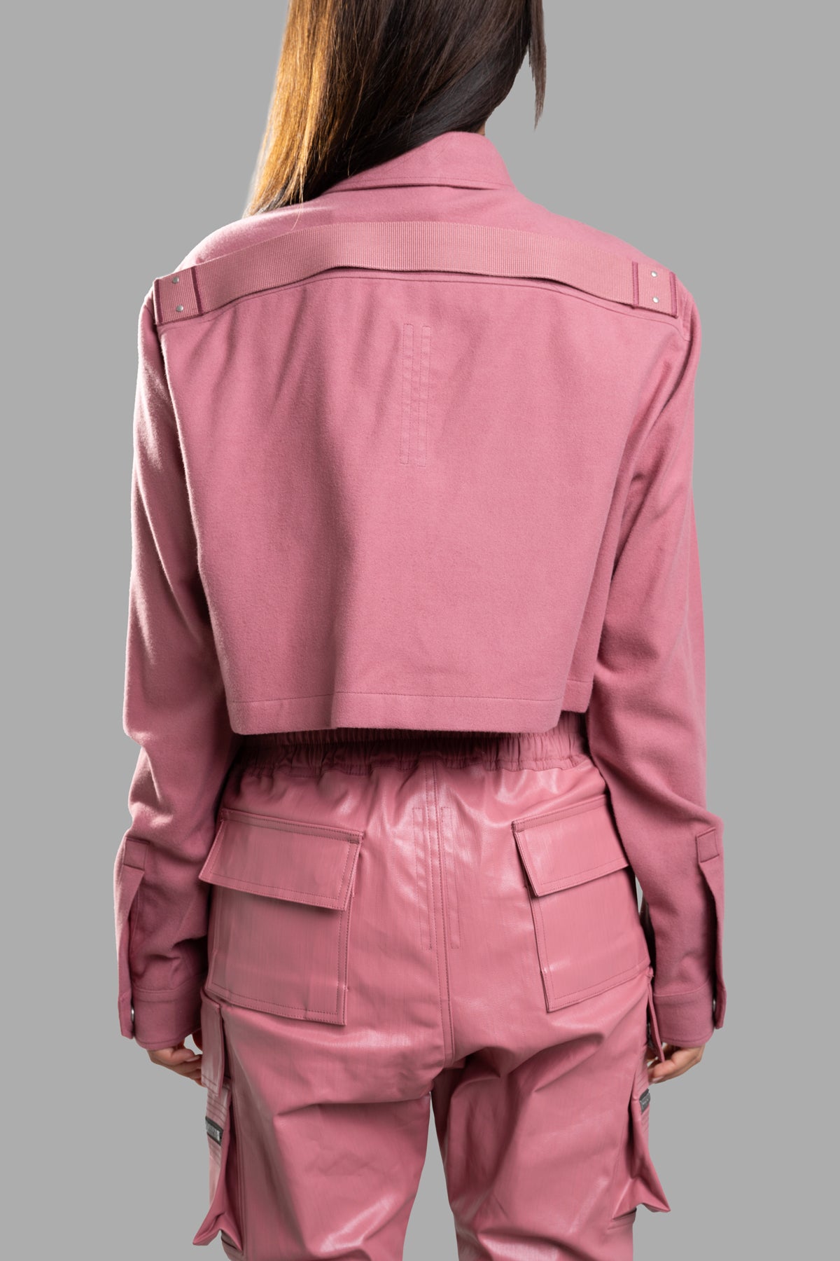 Rick Owens Cropped Outershirt in pink, showing a back view with flapped pockets and cropped length for a modern silhouette.