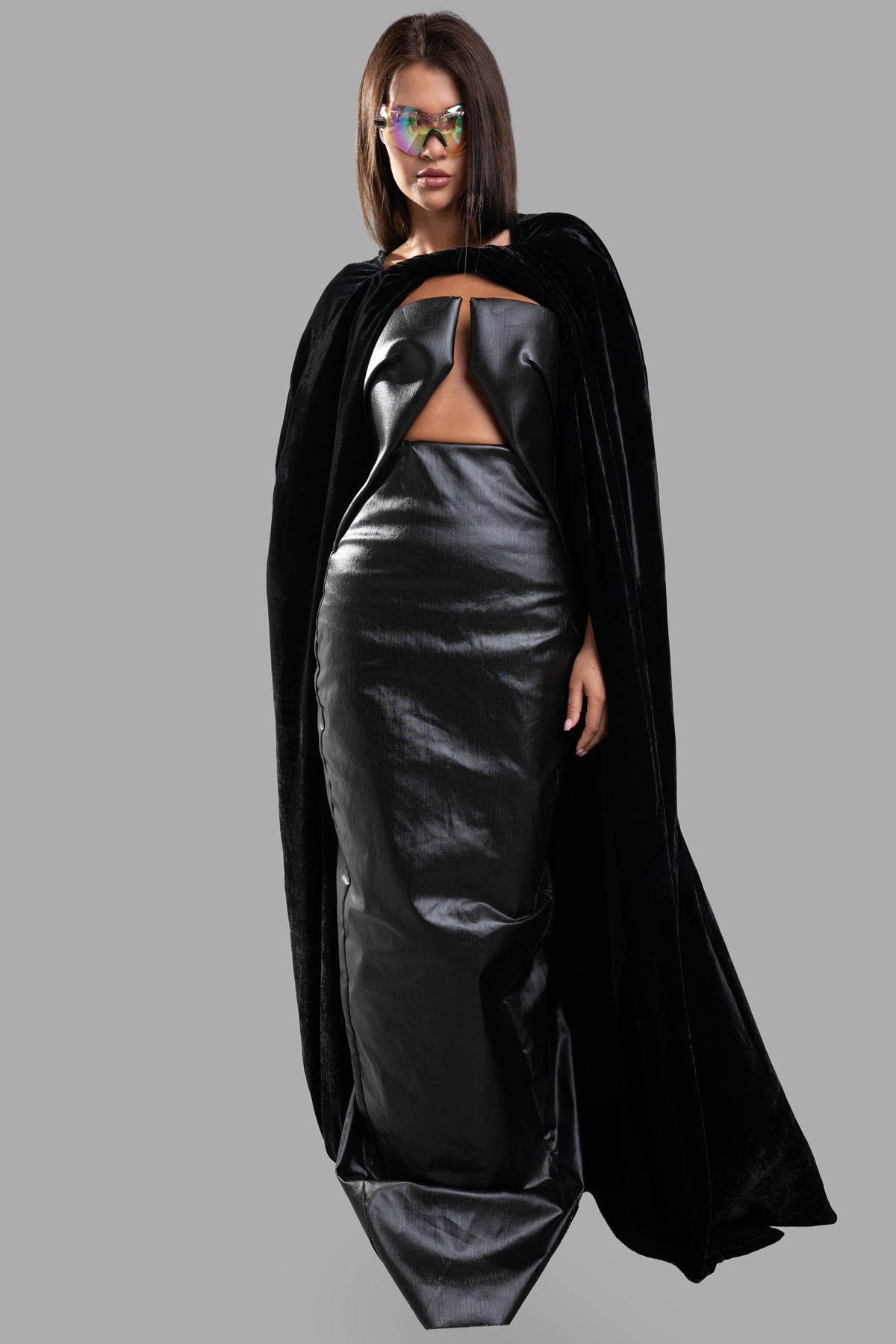 Rick Owens Porterville Masto Cape in black velvet, front view on model, featuring floor-length design with neck twist.