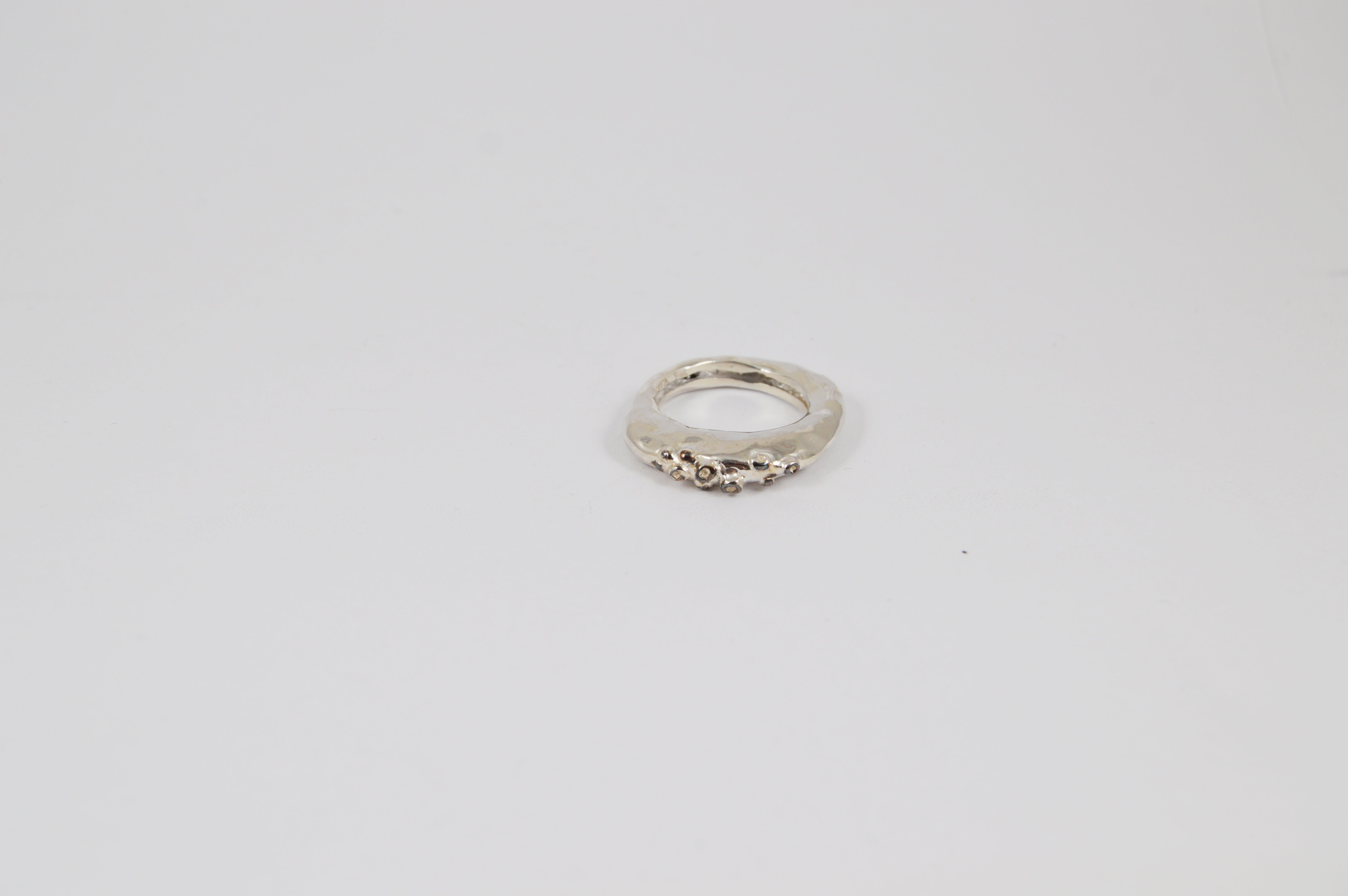 Rosa Maria. Razan 3 Ring in silver featuring raw organic shapes and icy grey diamonds, beautifully handcrafted design.