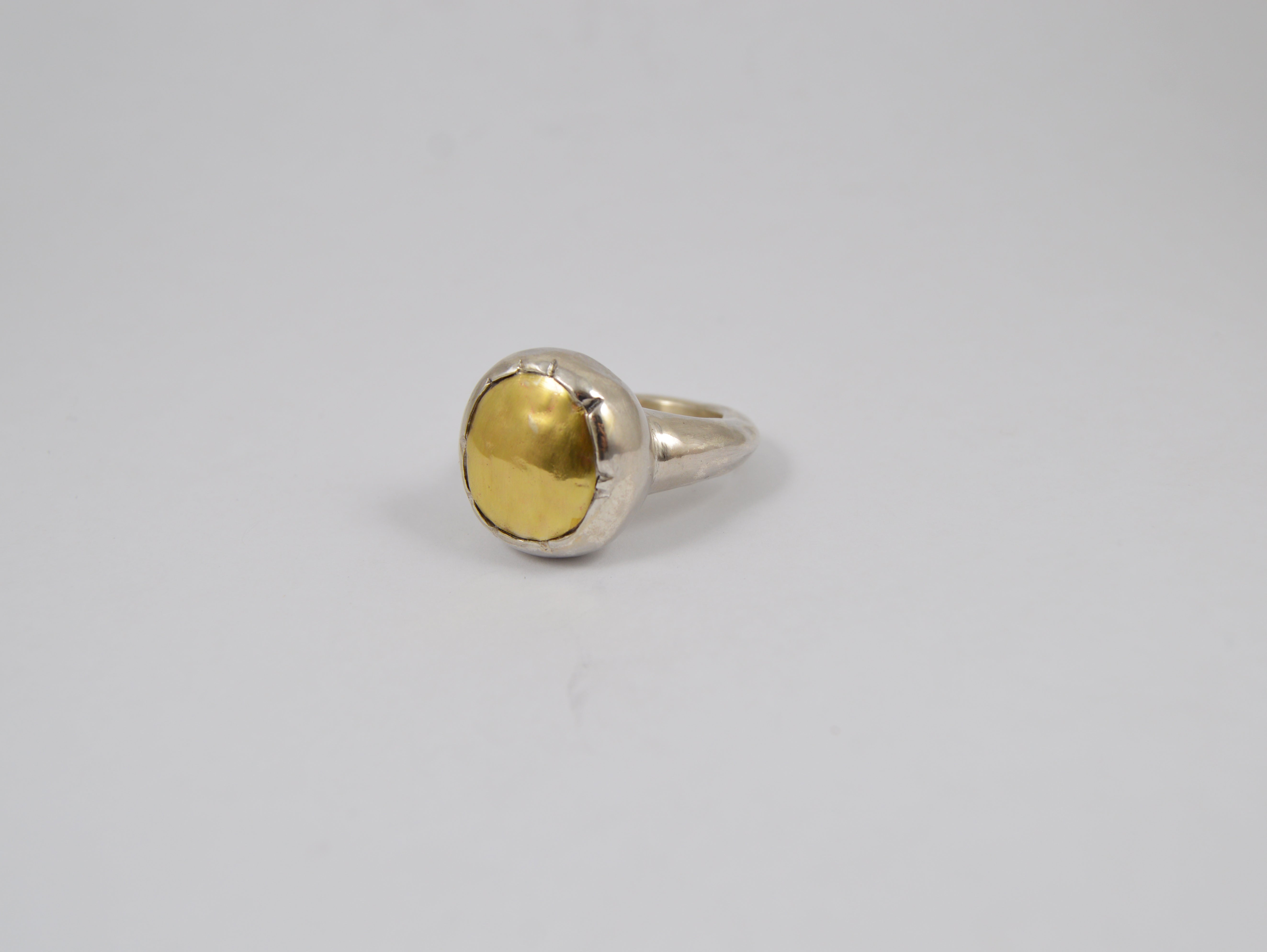 Rosa Maria Robbie 4 Ring; silver and copper with a raw, organic shape; angled front view.