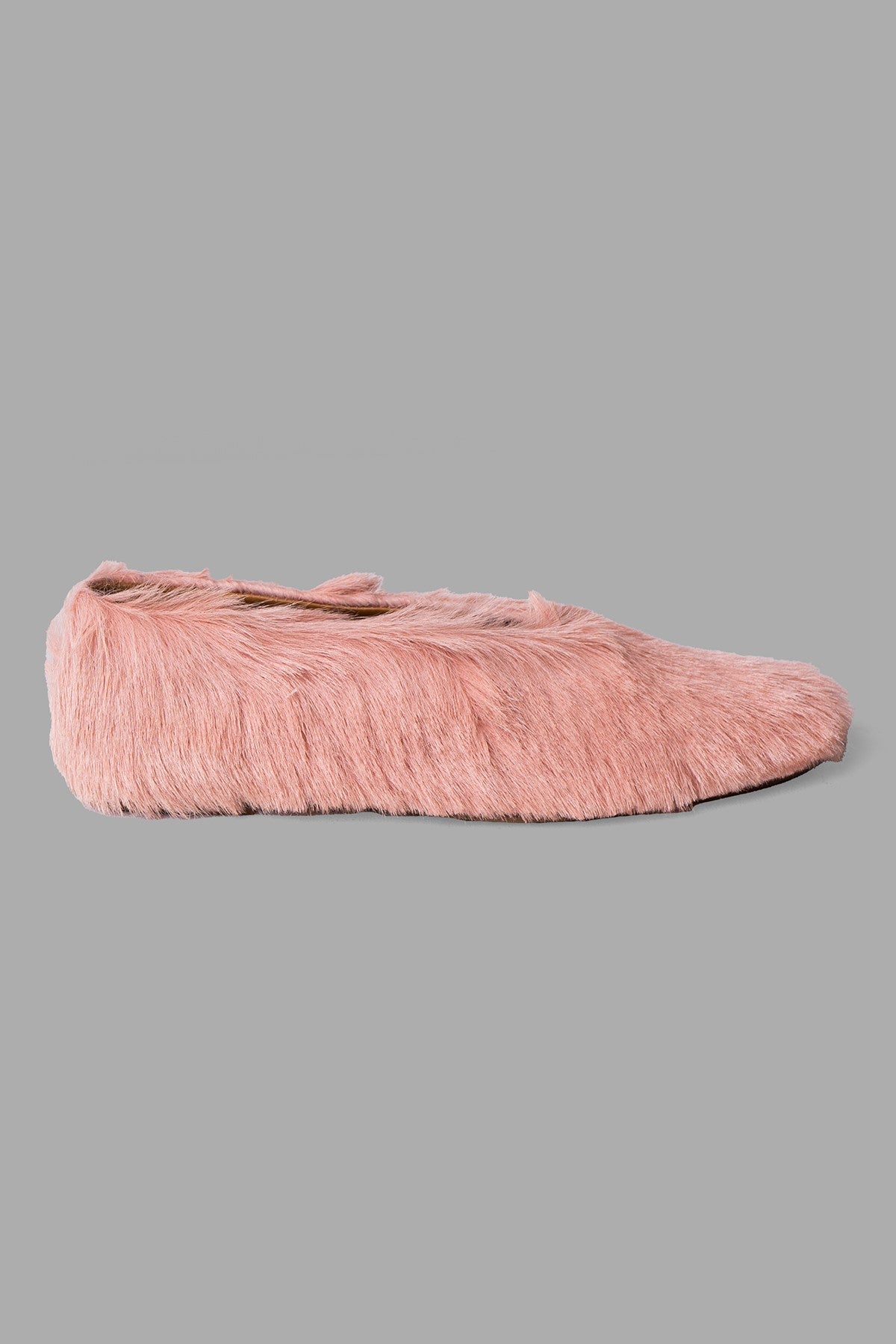 By Malene Birger Merina Leather Flats in pink, side view showing pointy silhouette with furry calf leather texture.